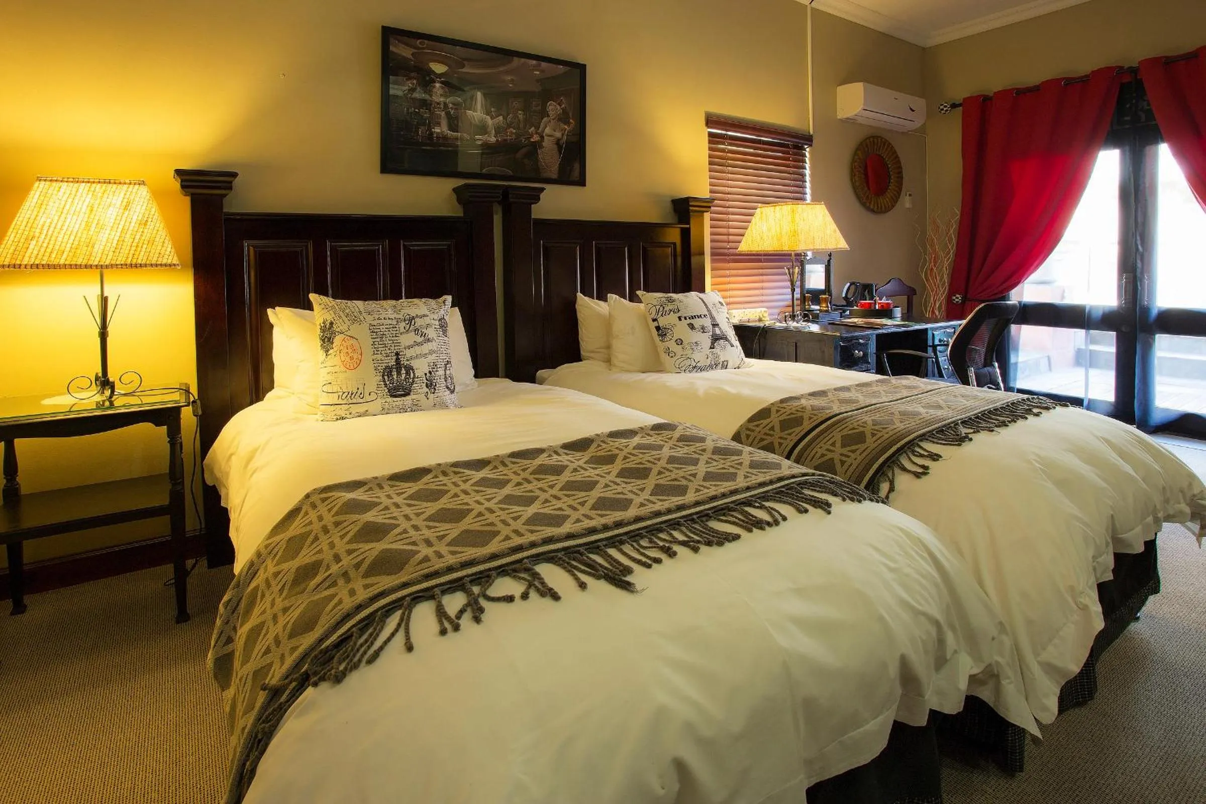 Bed in The Royal Palm B&B