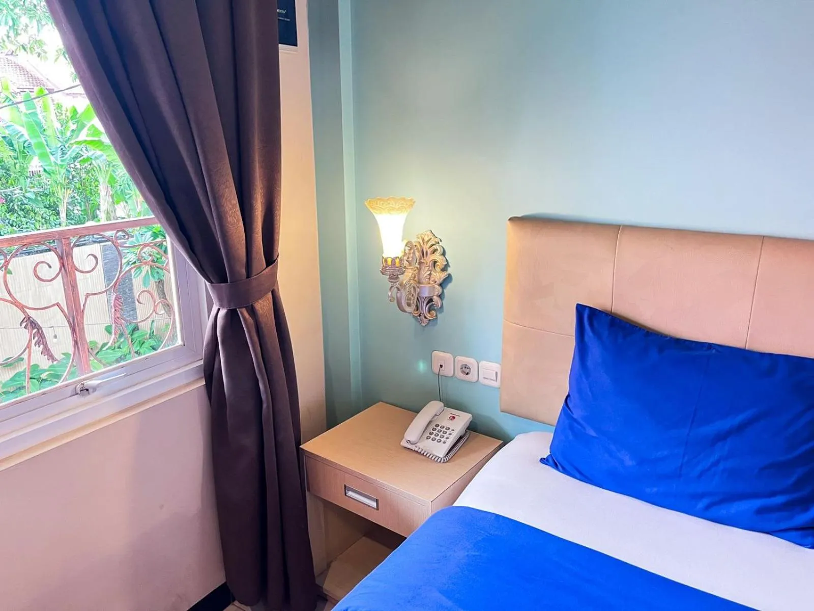 Bed in Ceria Boutique Hotel