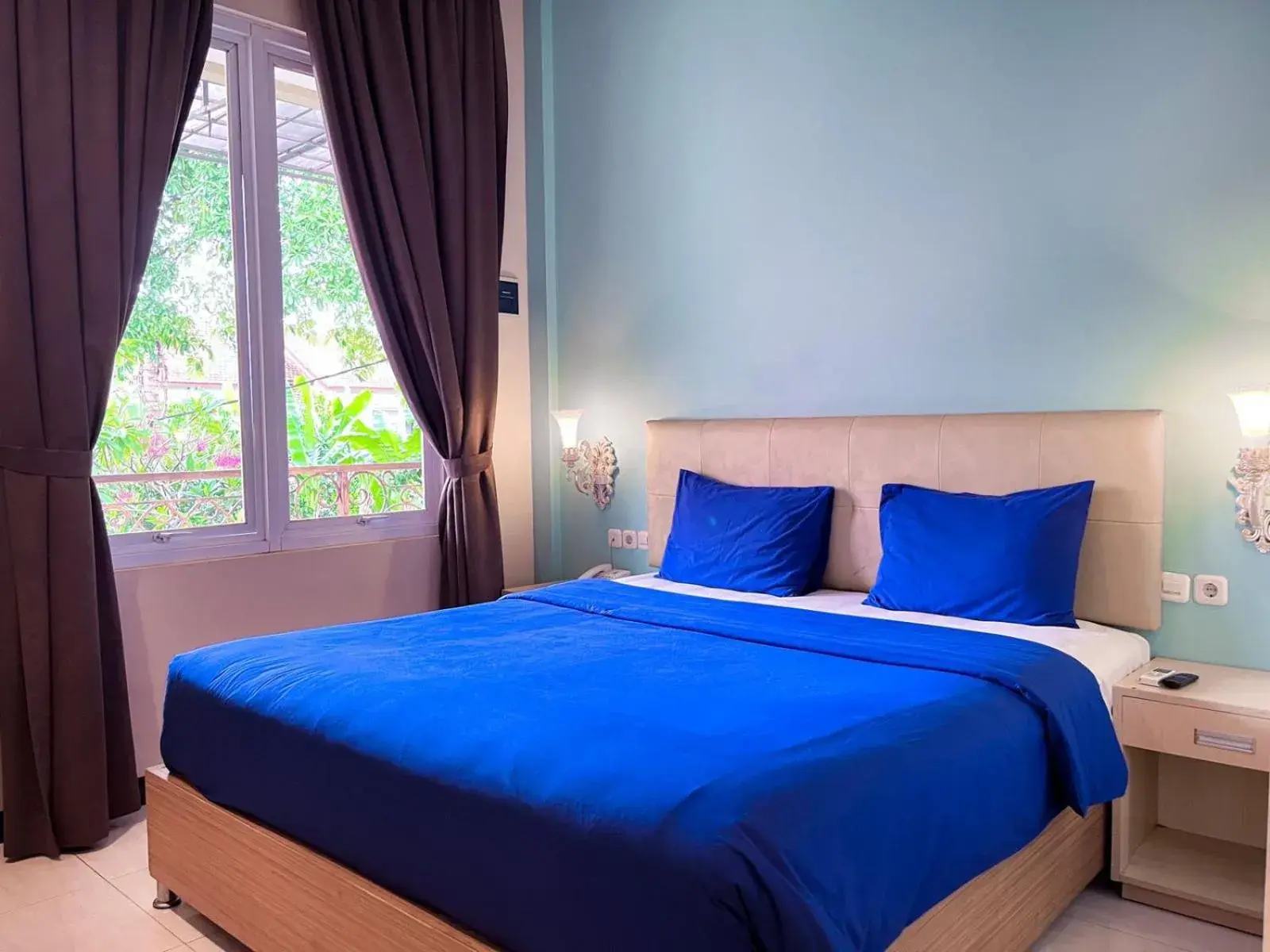 Bed in Ceria Boutique Hotel Bed in Ceria Boutique Hotel