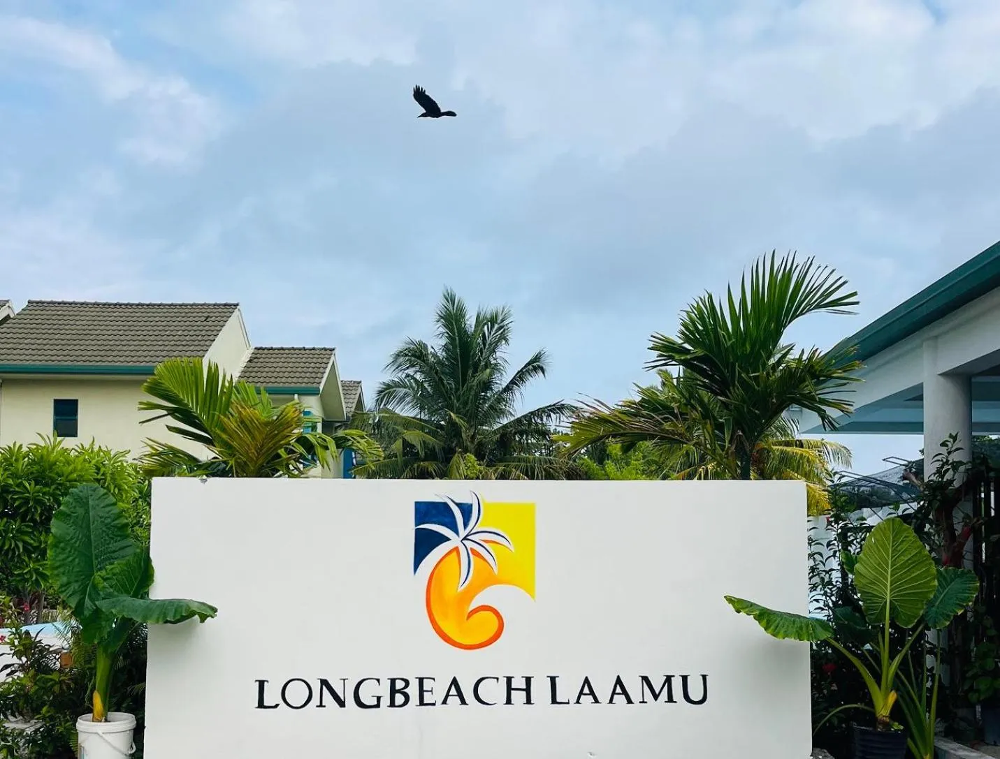 Property logo or sign in Long Beach Laamu Hotel