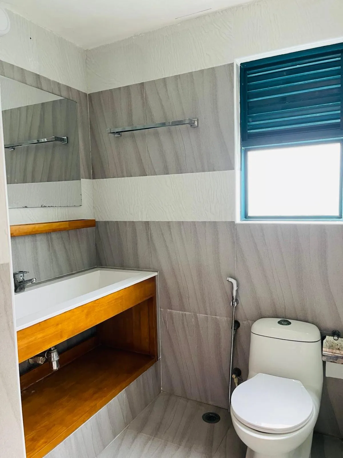 Toilet in Long Beach Laamu Hotel