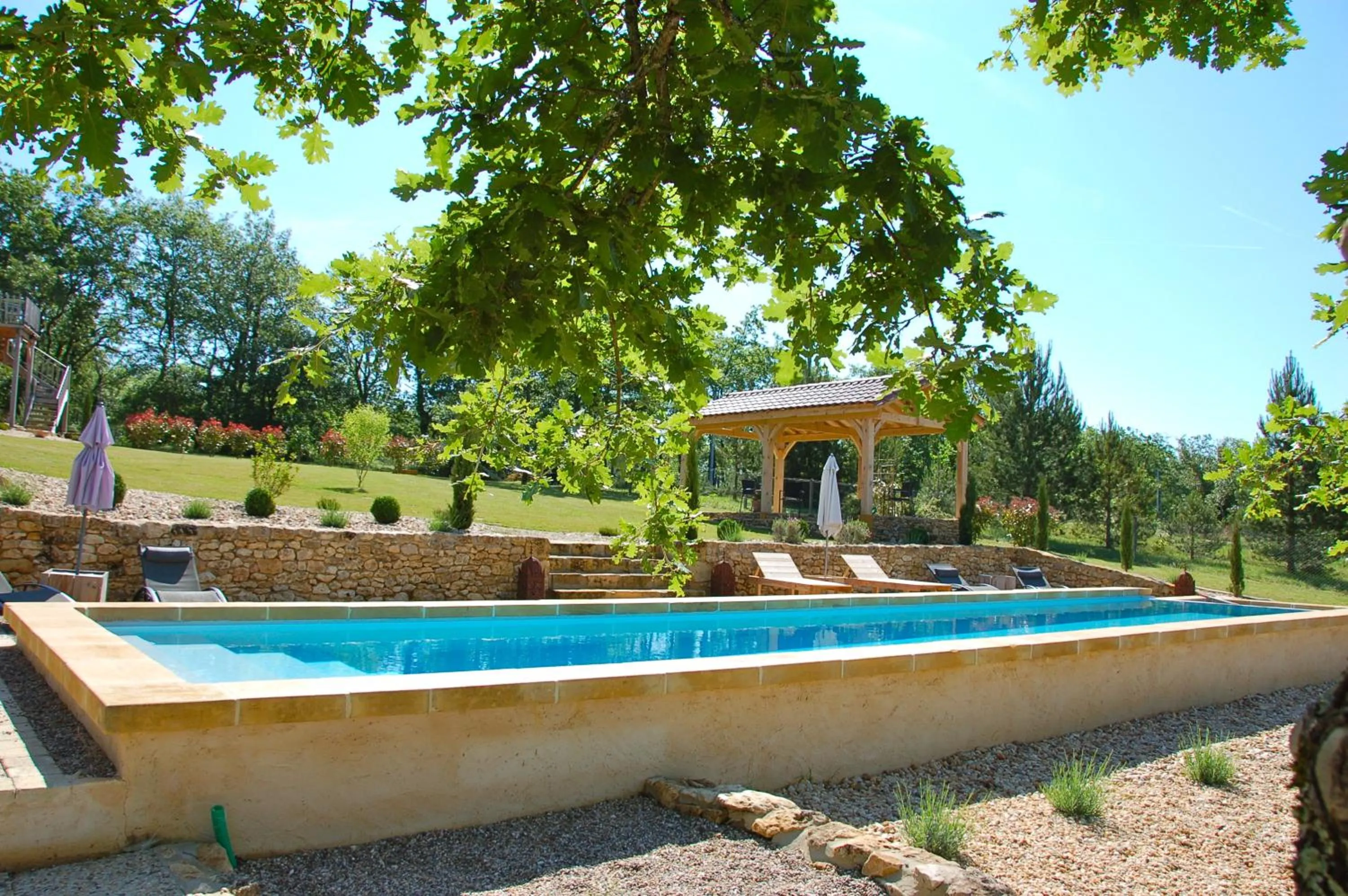 Pool view in Le Lion D'Or en PERIGORD