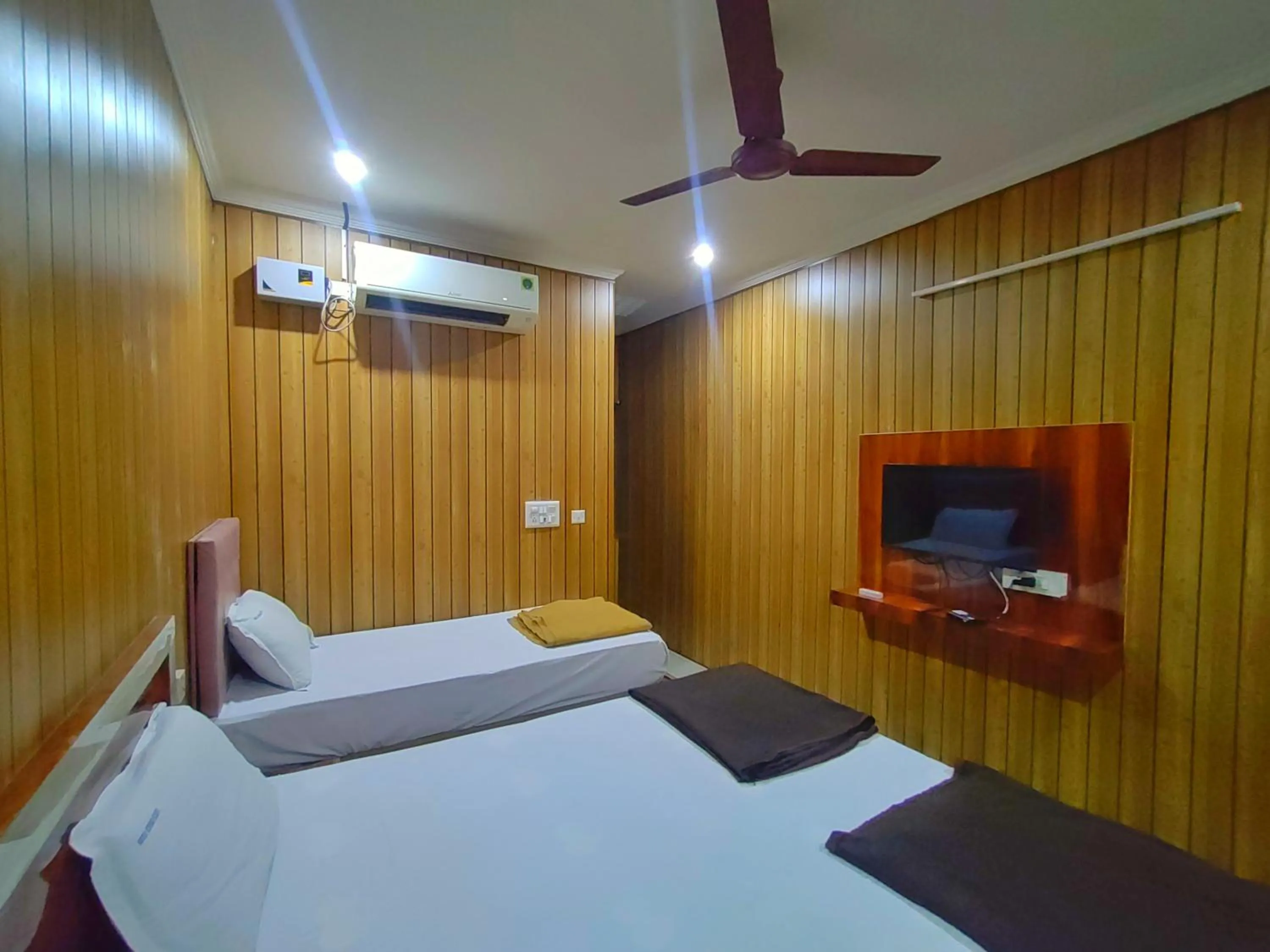 Bed in Hotel Govindh Heights