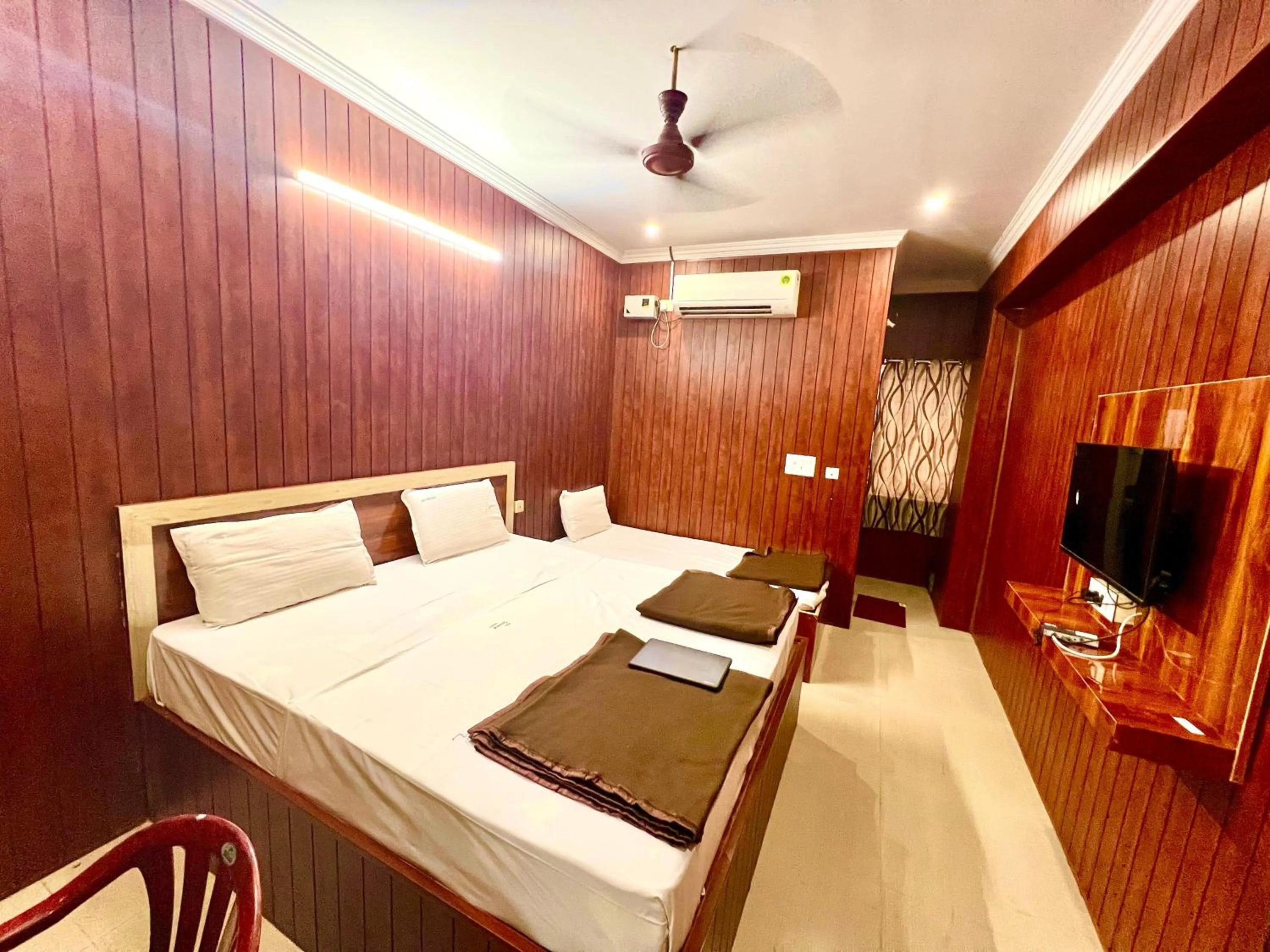 Bed in Hotel Govindh Heights