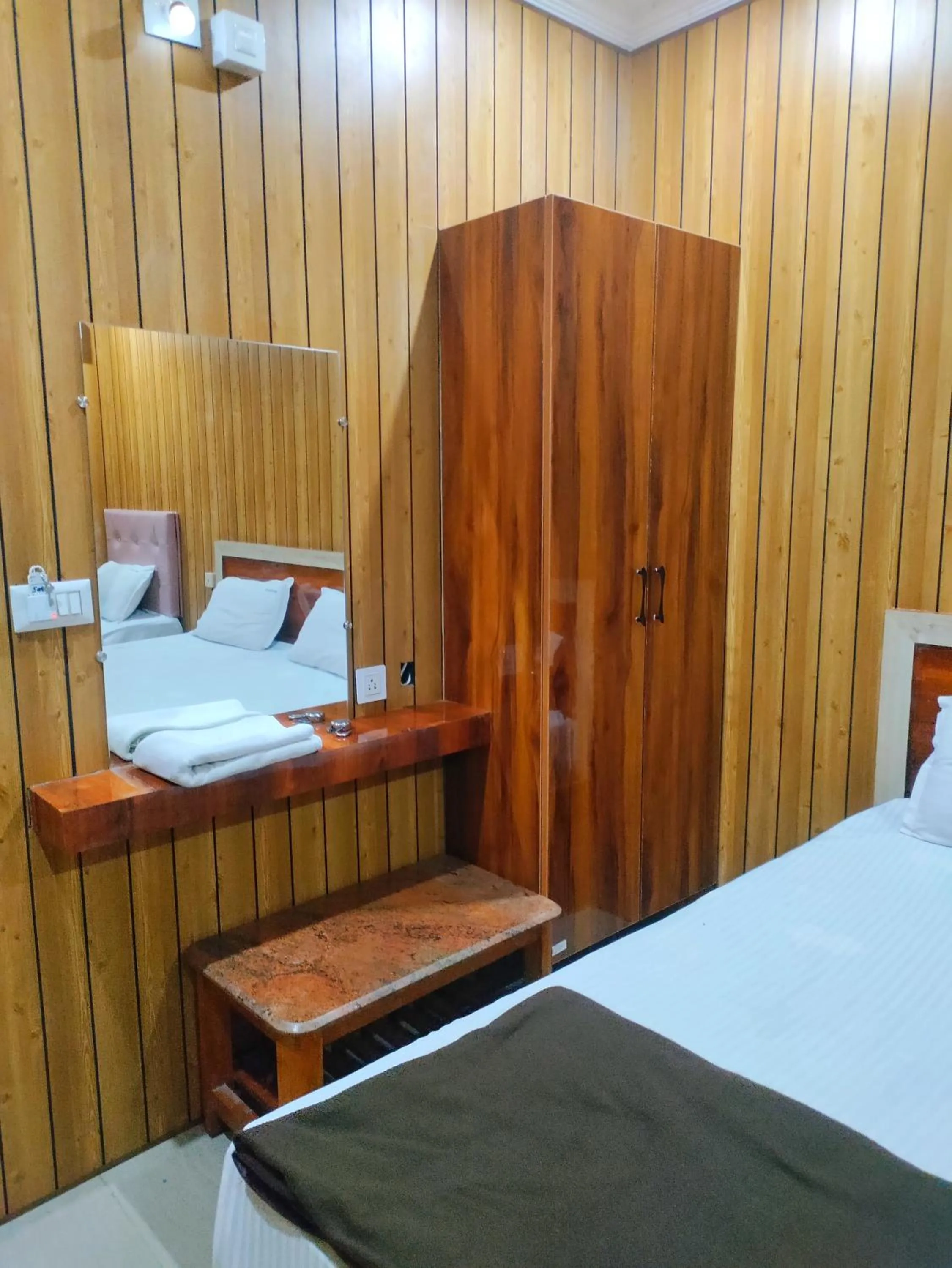 Bed in Hotel Govindh Heights