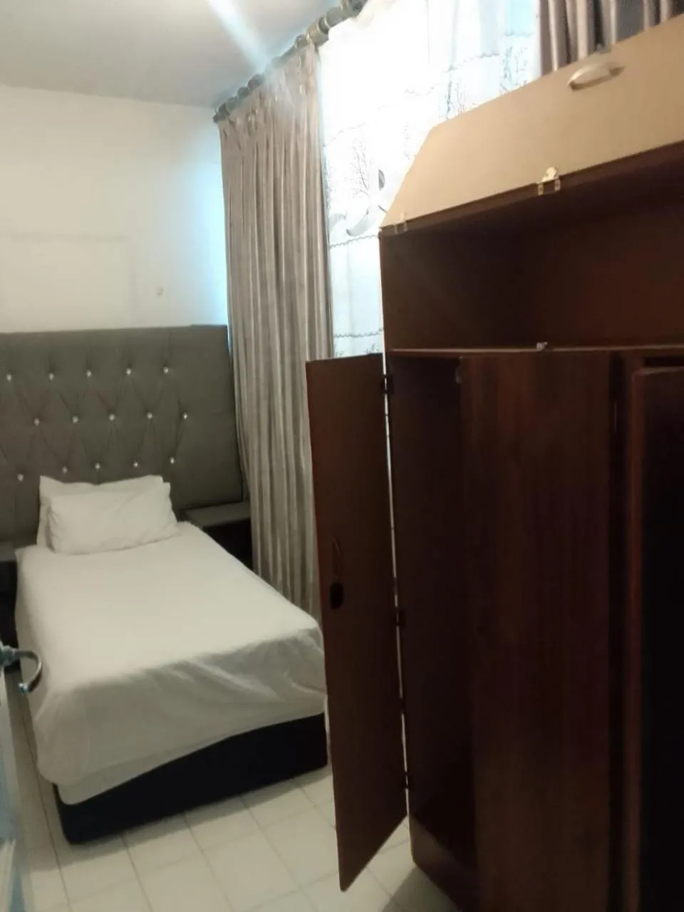 Bed in Central Sandton Rooms Nowifi