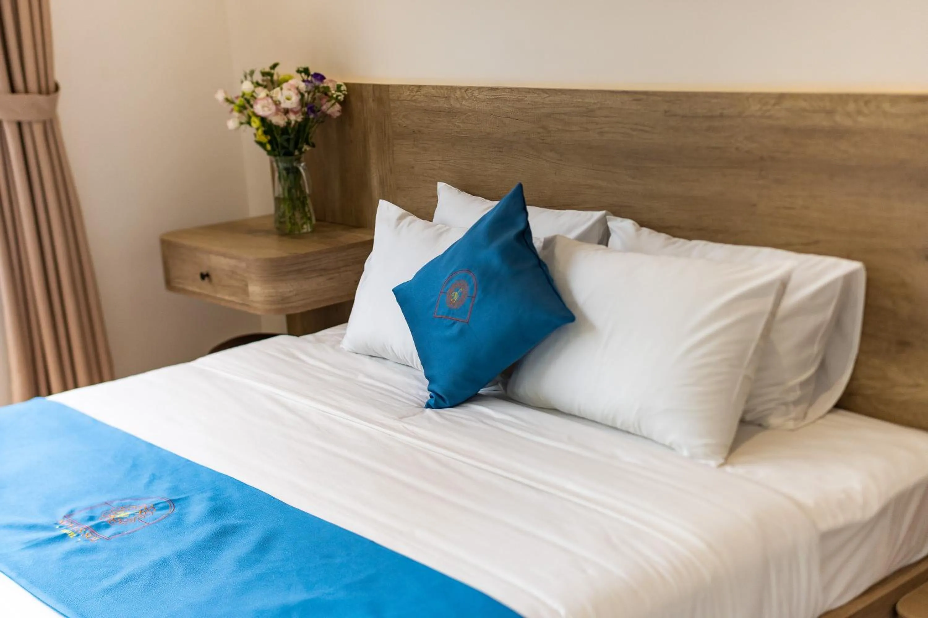Bed in Novus Sol Hotel & Apartment Sunset Town Phu Quoc