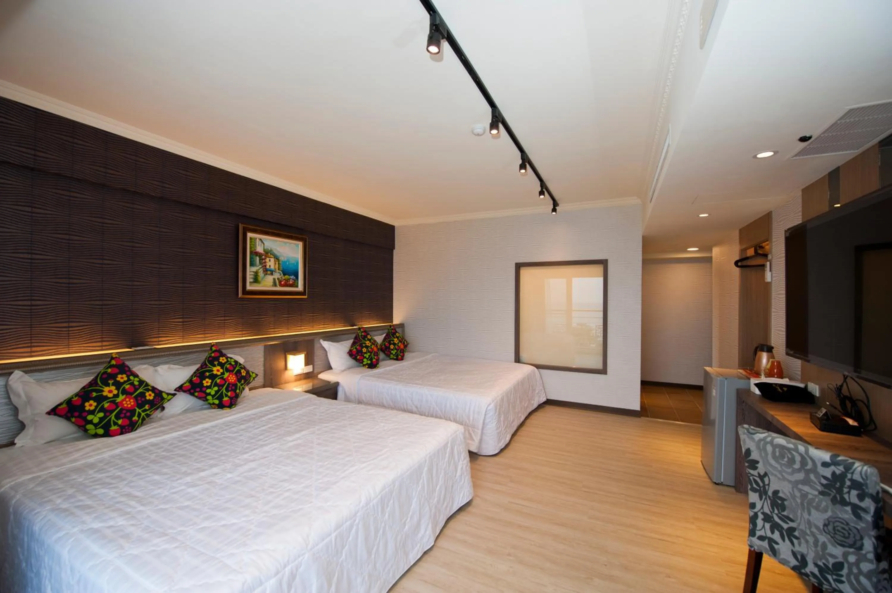 Bed in 墾丁品喬旅店