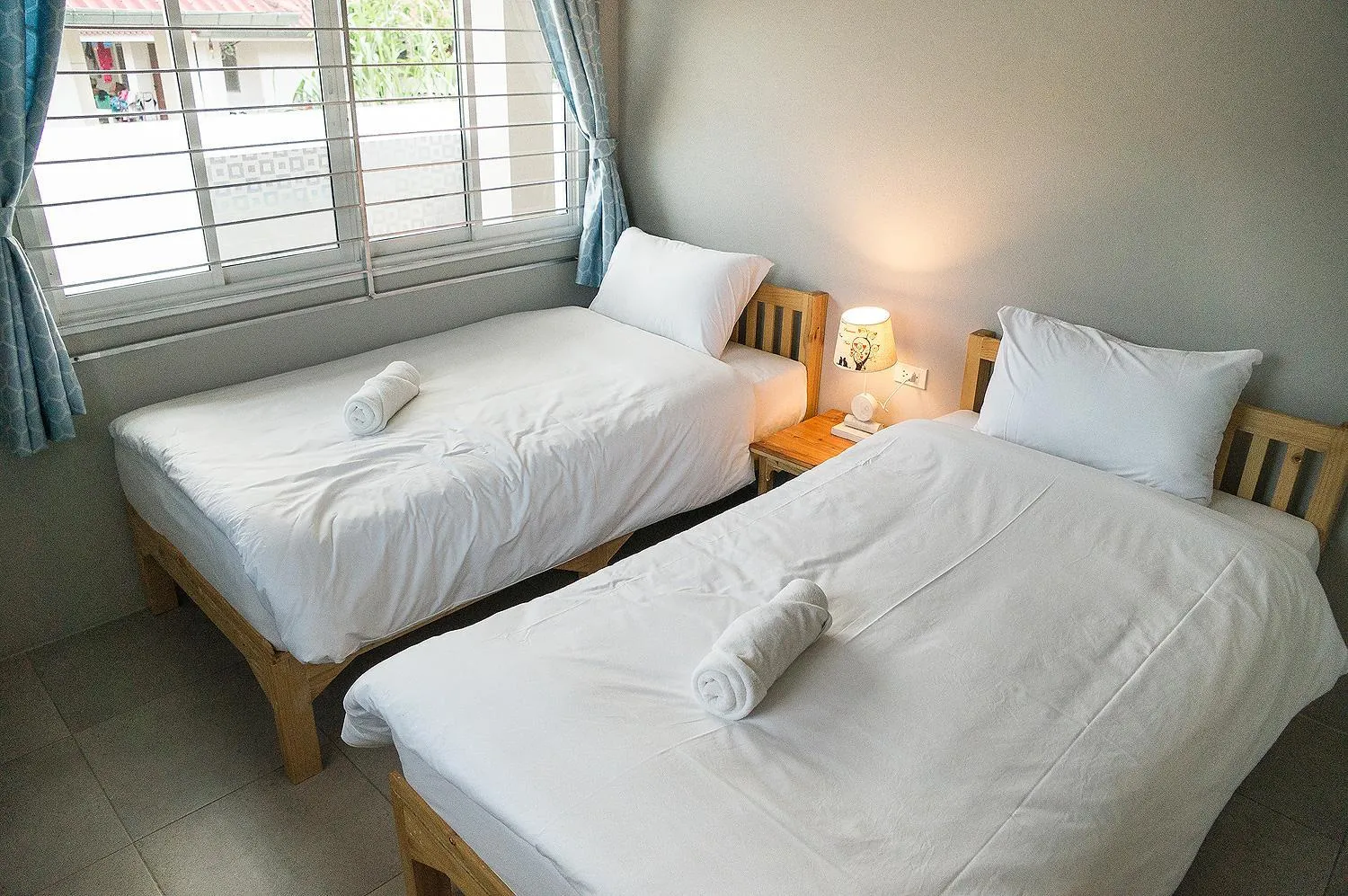 Bed in Chiang Mai Bann Income Homestay
