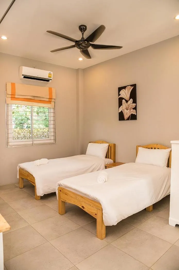 Bed in Chiang Mai Bann Income Homestay
