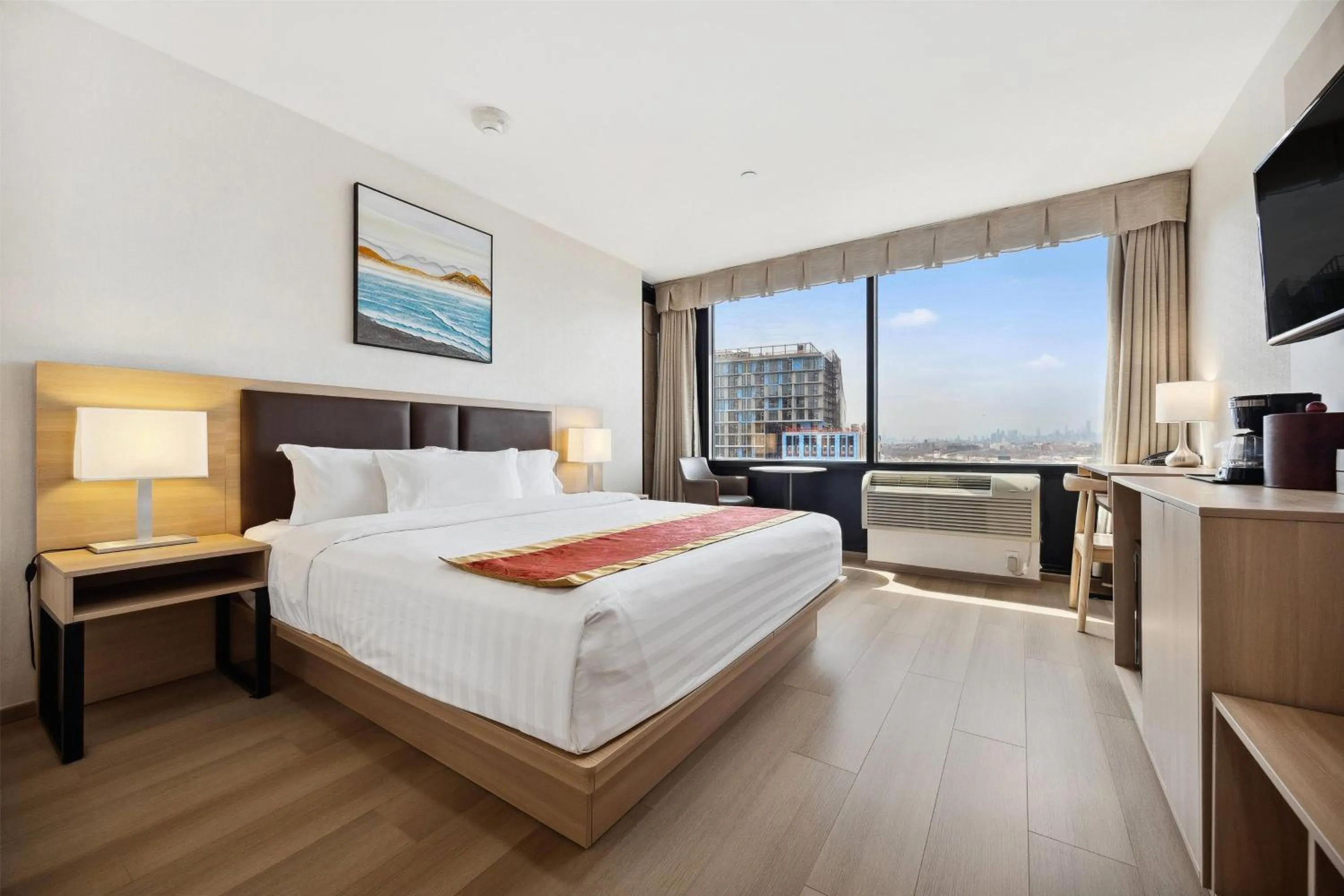 Photo of the whole room, Bed in Ramada by Wyndham Flushing Queens