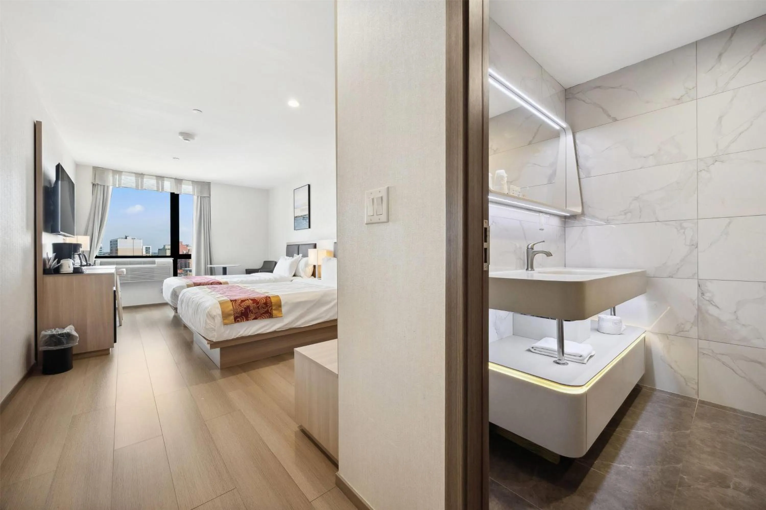 Photo of the whole room, Bed in Ramada by Wyndham Flushing Queens