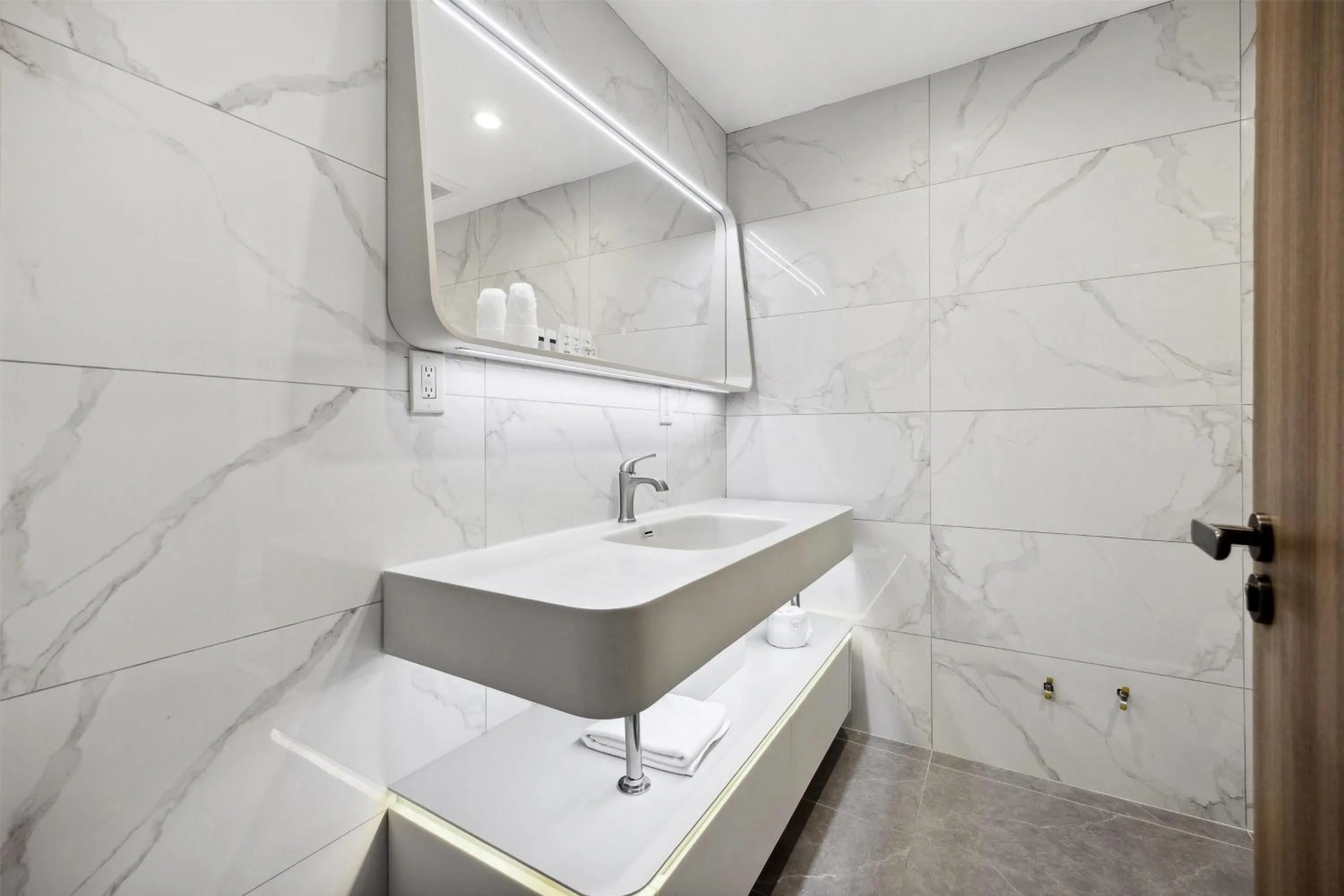 Bathroom in Ramada by Wyndham Flushing Queens