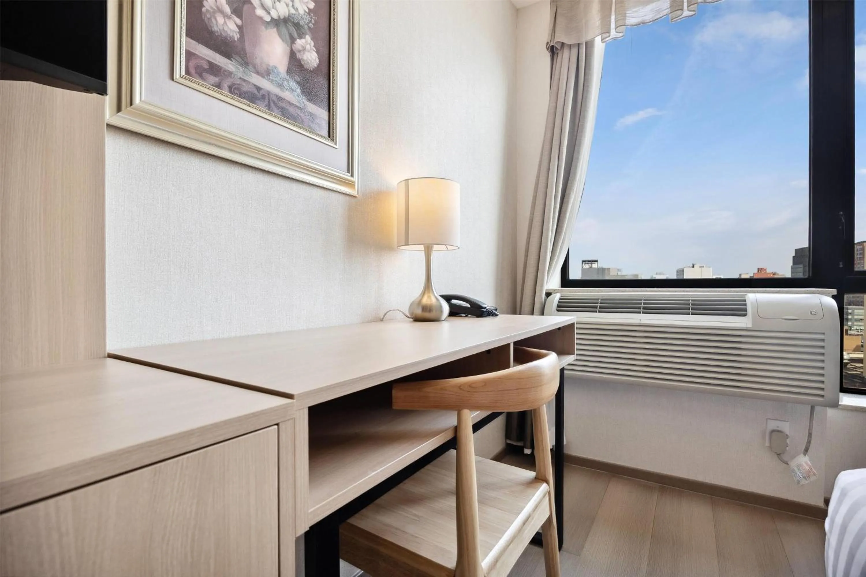 Photo of the whole room in Ramada by Wyndham Flushing Queens