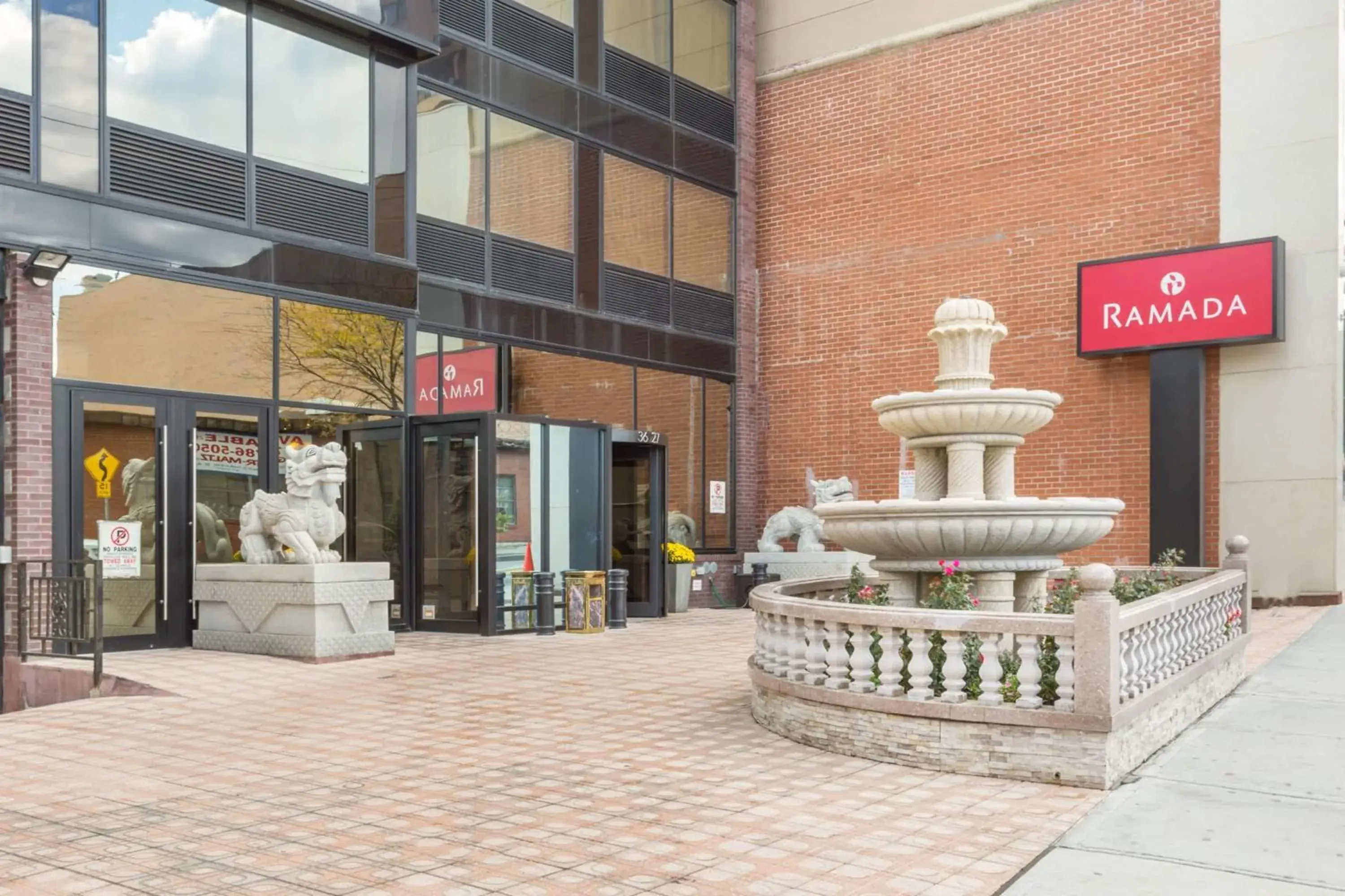Property building in Ramada by Wyndham Flushing Queens Property building in Ramada by Wyndham Flushing Queens