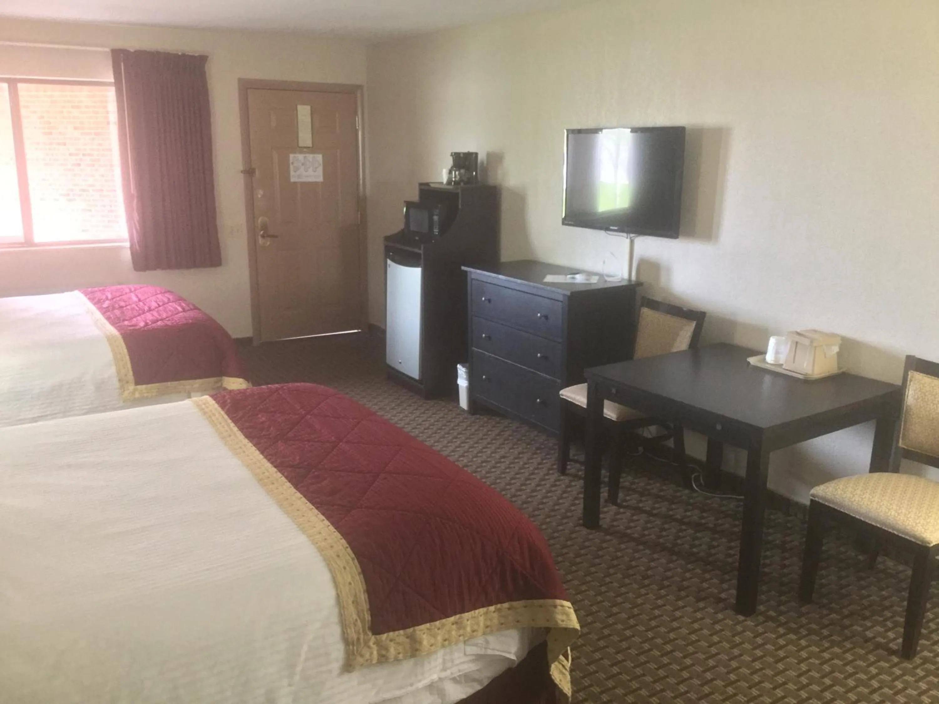 Photo of the whole room, Bed in Baymont by Wyndham Cortez