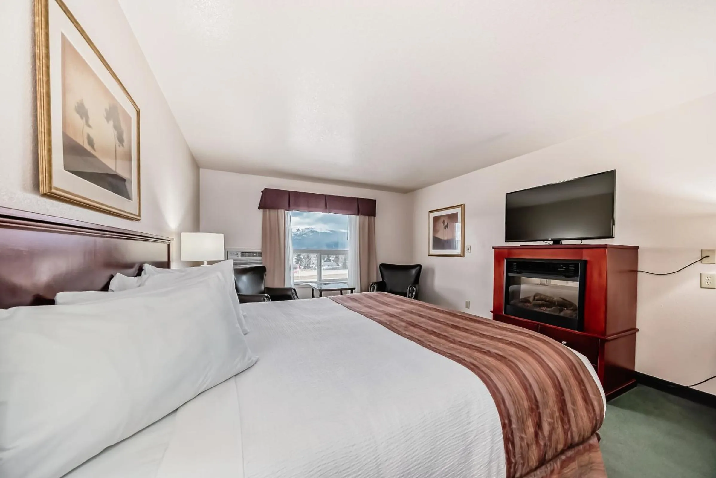 Bed in Grande Cache Inn & Suites