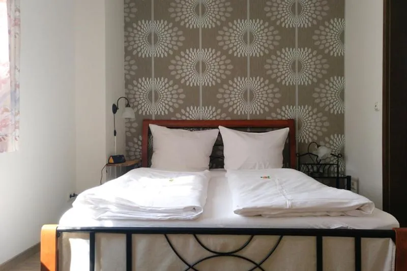 Bed in Weinhaus Kurtrierer Hof