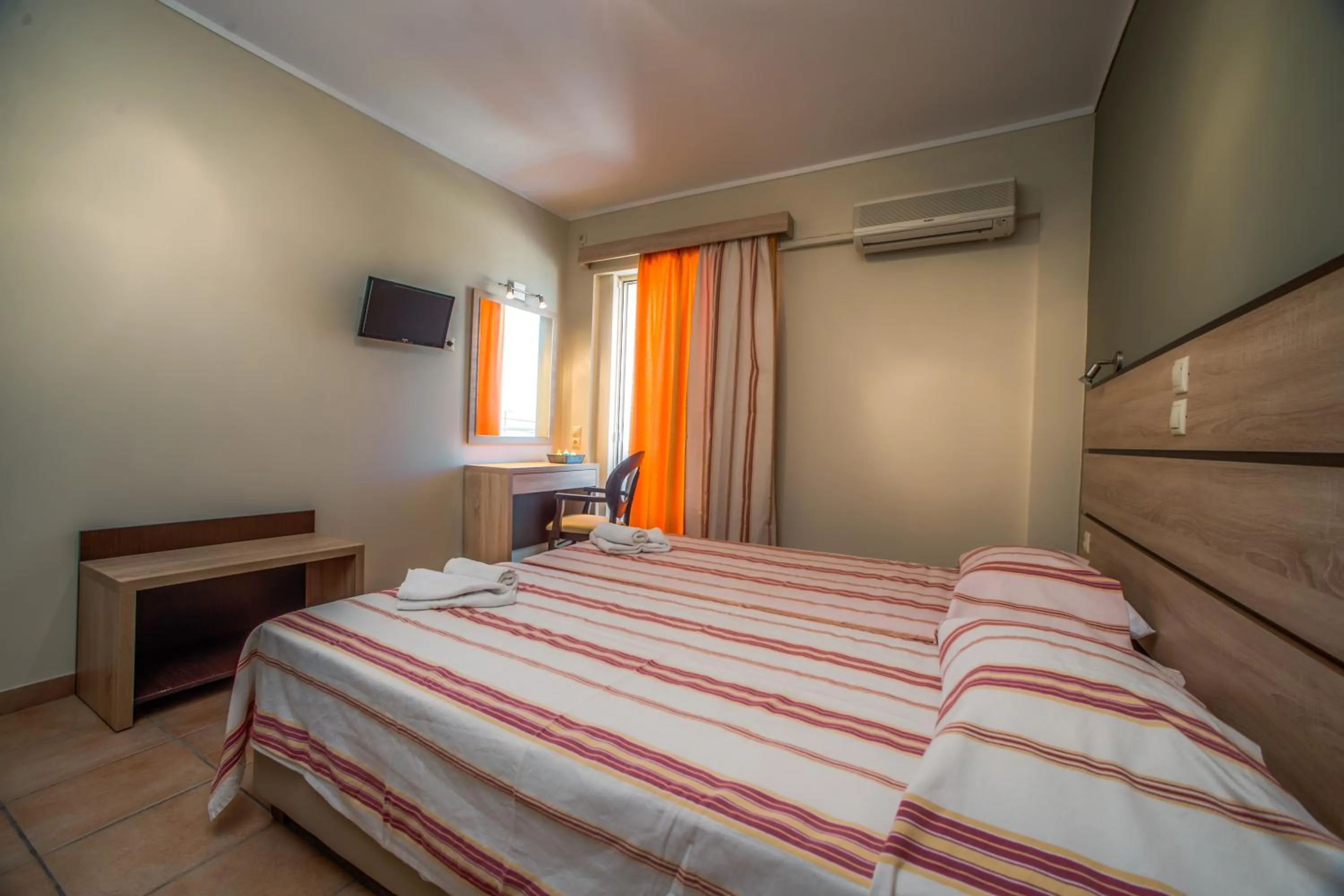 Bed in Natalie Hotel