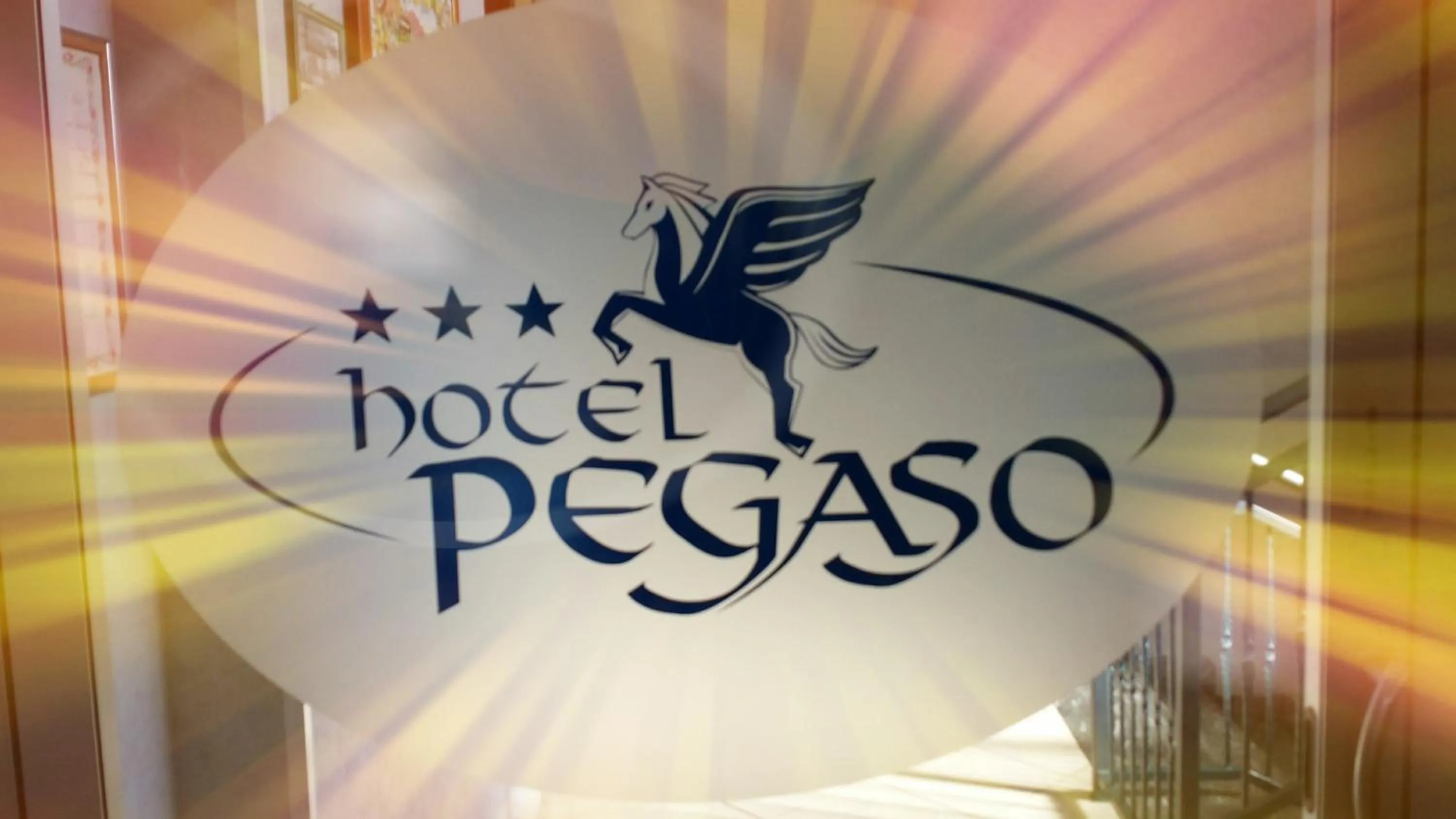 Property logo or sign in Hotel Pegaso