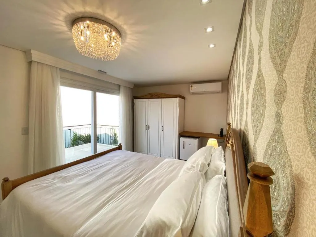 Photo of the whole room, Bed in Pousada Villa Vie