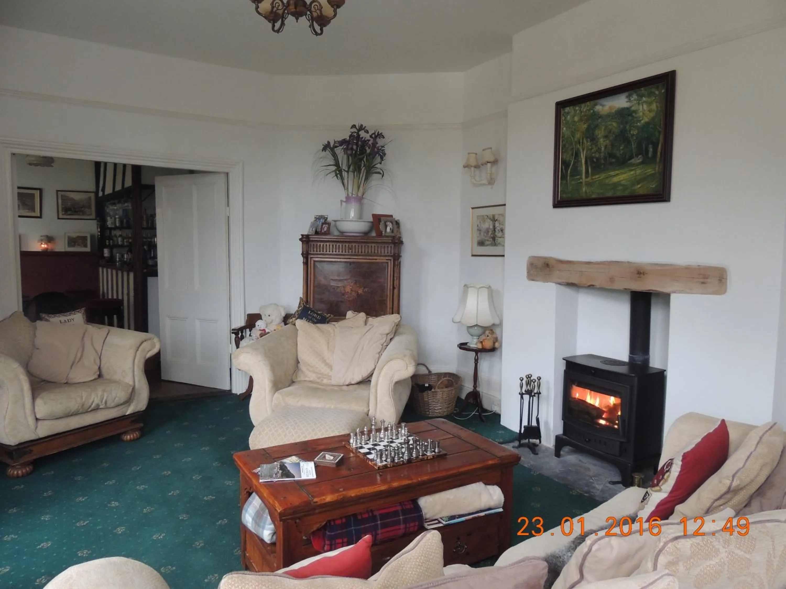 Communal lounge/ TV room in Orchard House Hotel