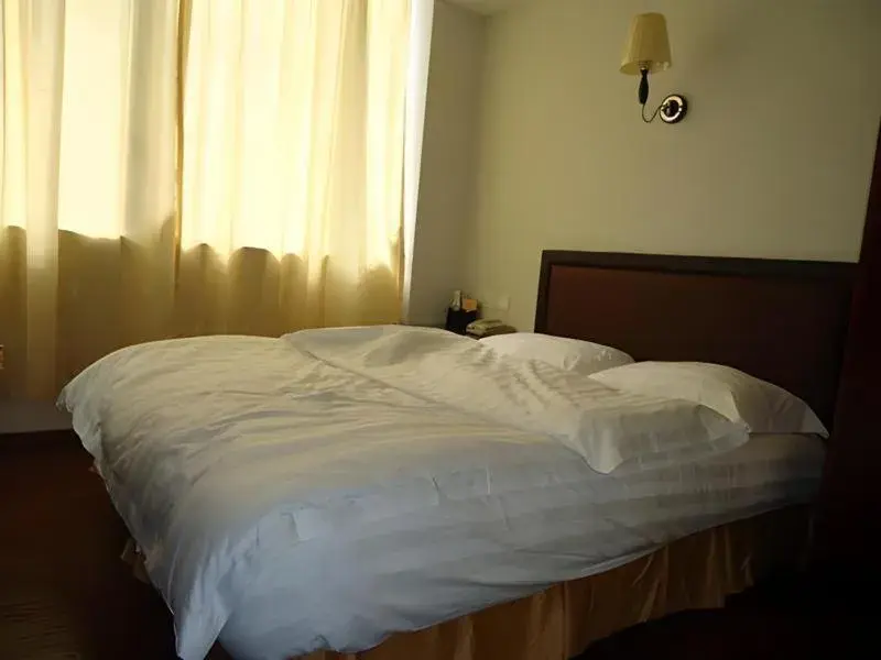 Bed in Aditya Hotel Bed in Aditya Hotel