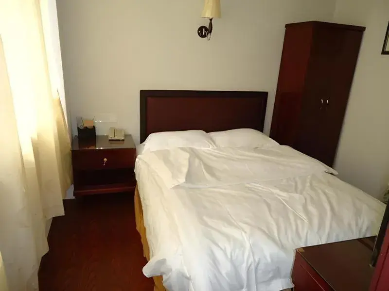 Bed in Aditya Hotel Bed in Aditya Hotel