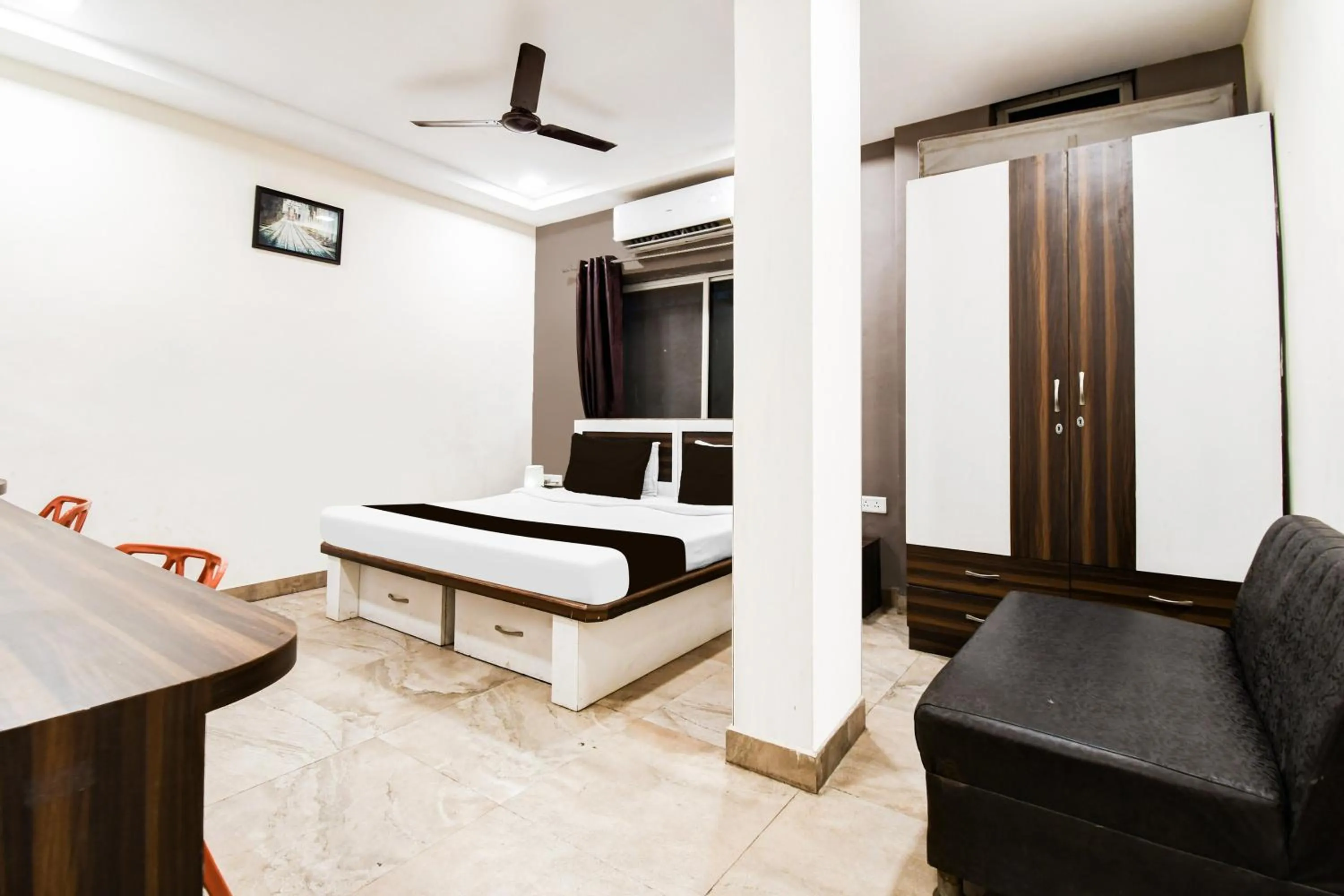 Bedroom in Hotel O Raipur City Center Formerly South Inn