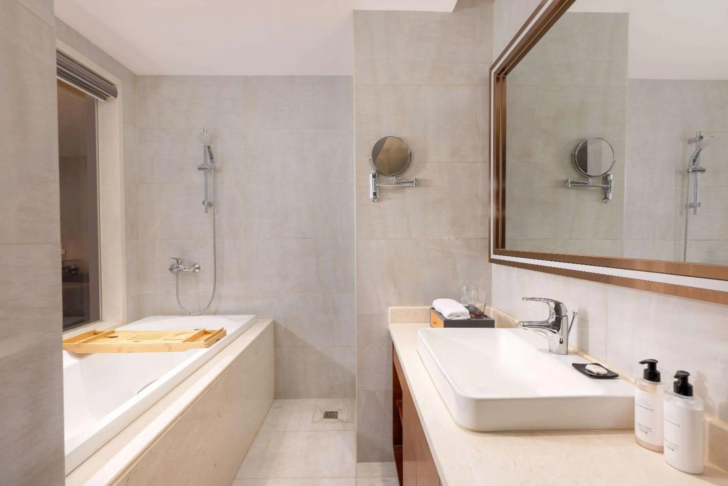 Bathroom in Ramada Encore by Wyndham Jingzhou Shashi