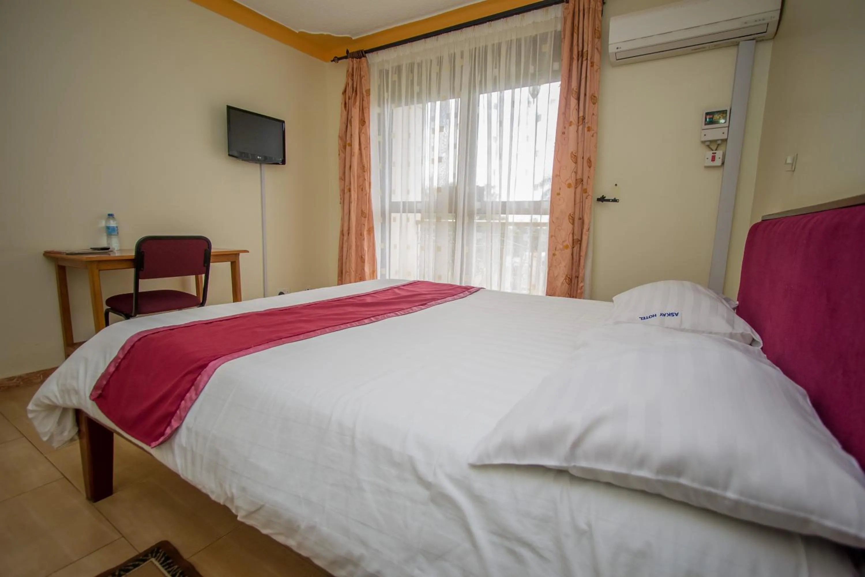 Bed in Askay Hotel Suites