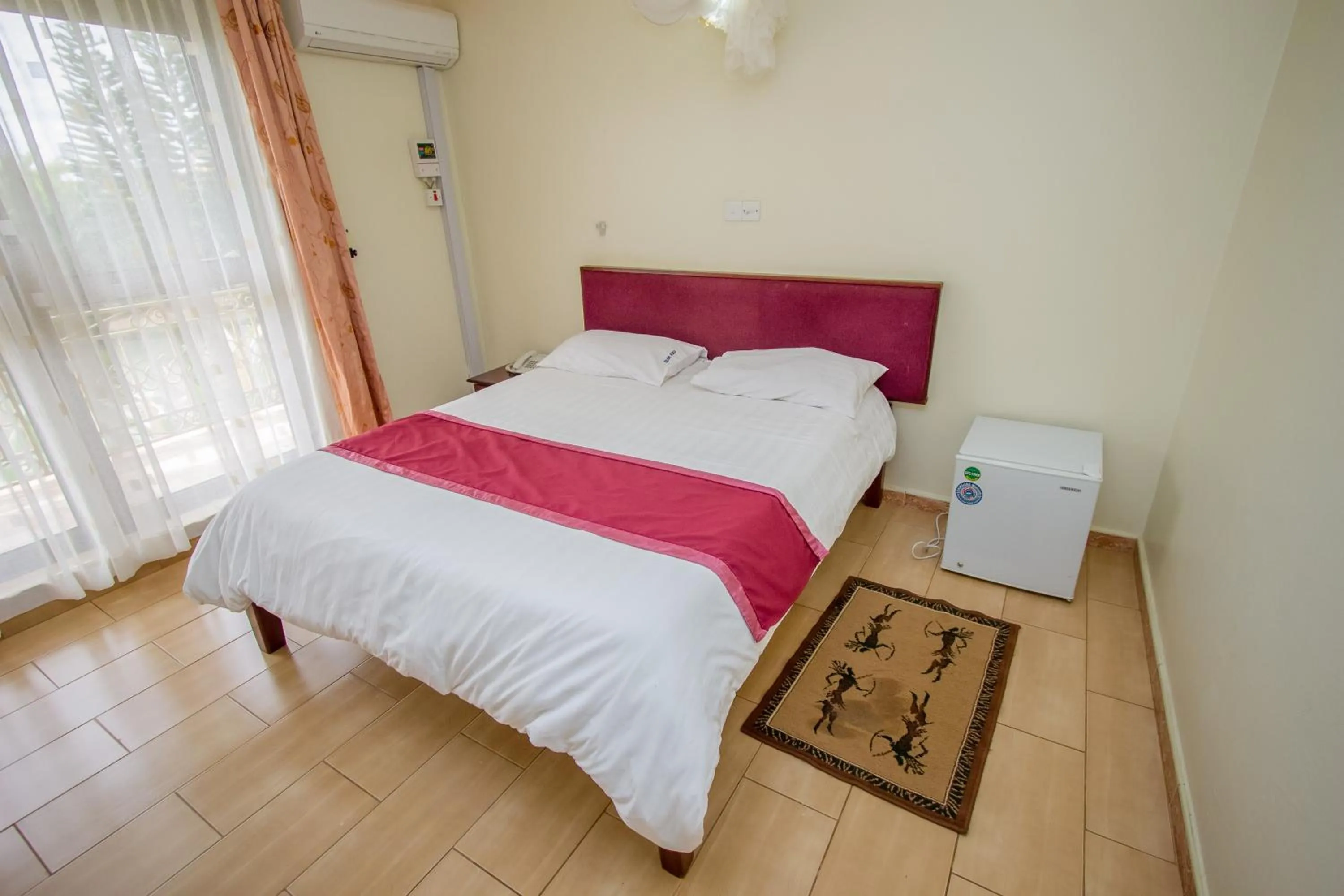 Bed in Askay Hotel Suites