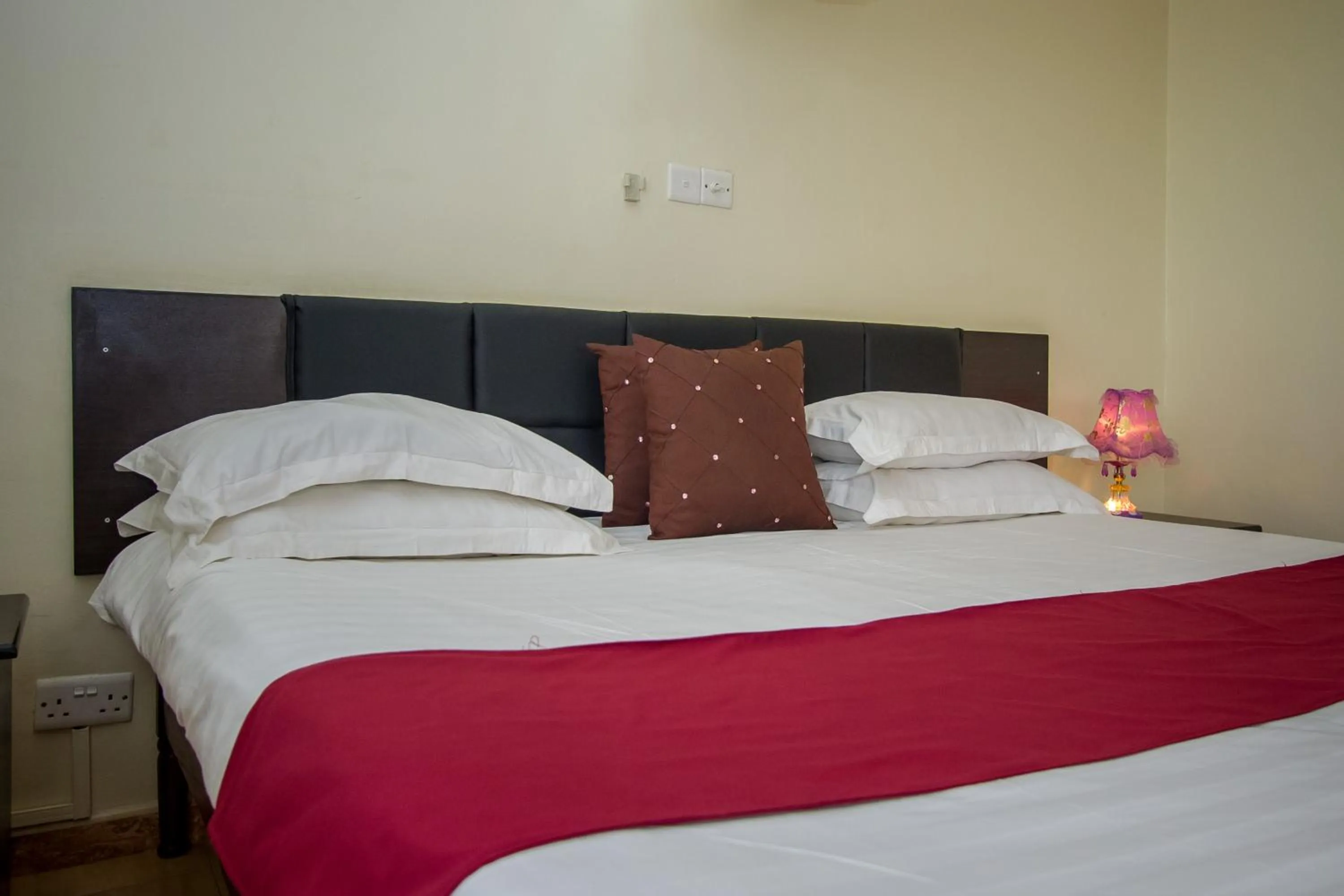 Bed in Askay Hotel Suites