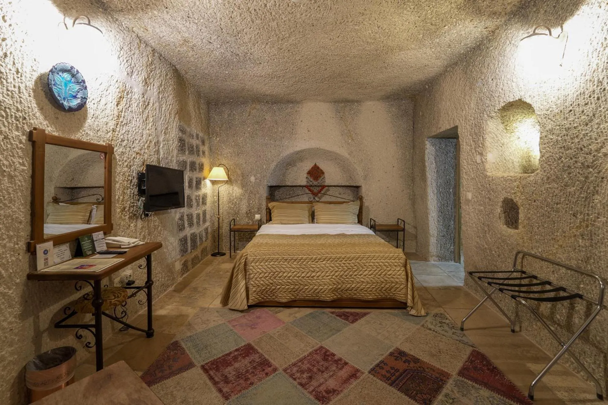 Bed in Tekkaya Cave Hotel