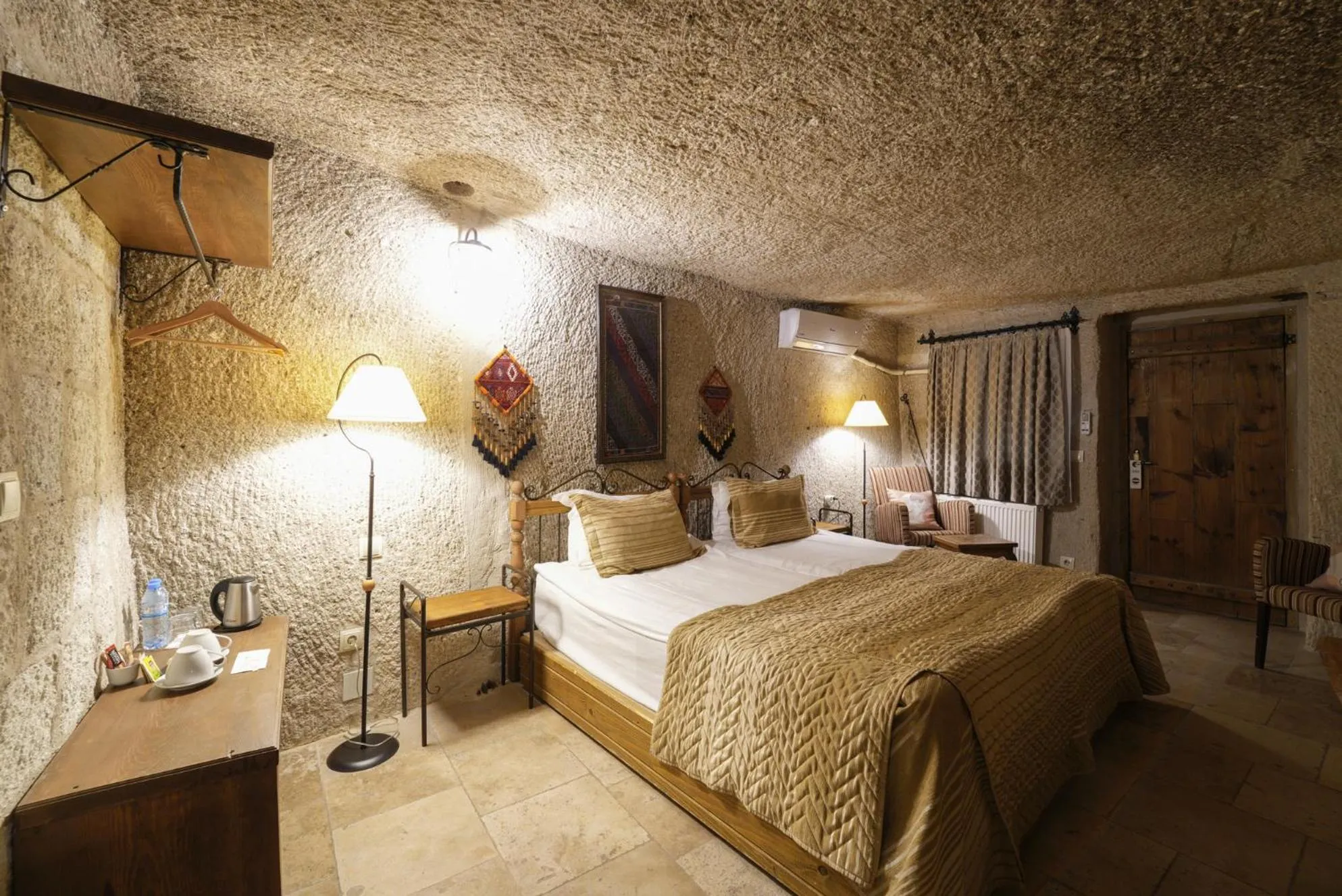 Bed in Tekkaya Cave Hotel