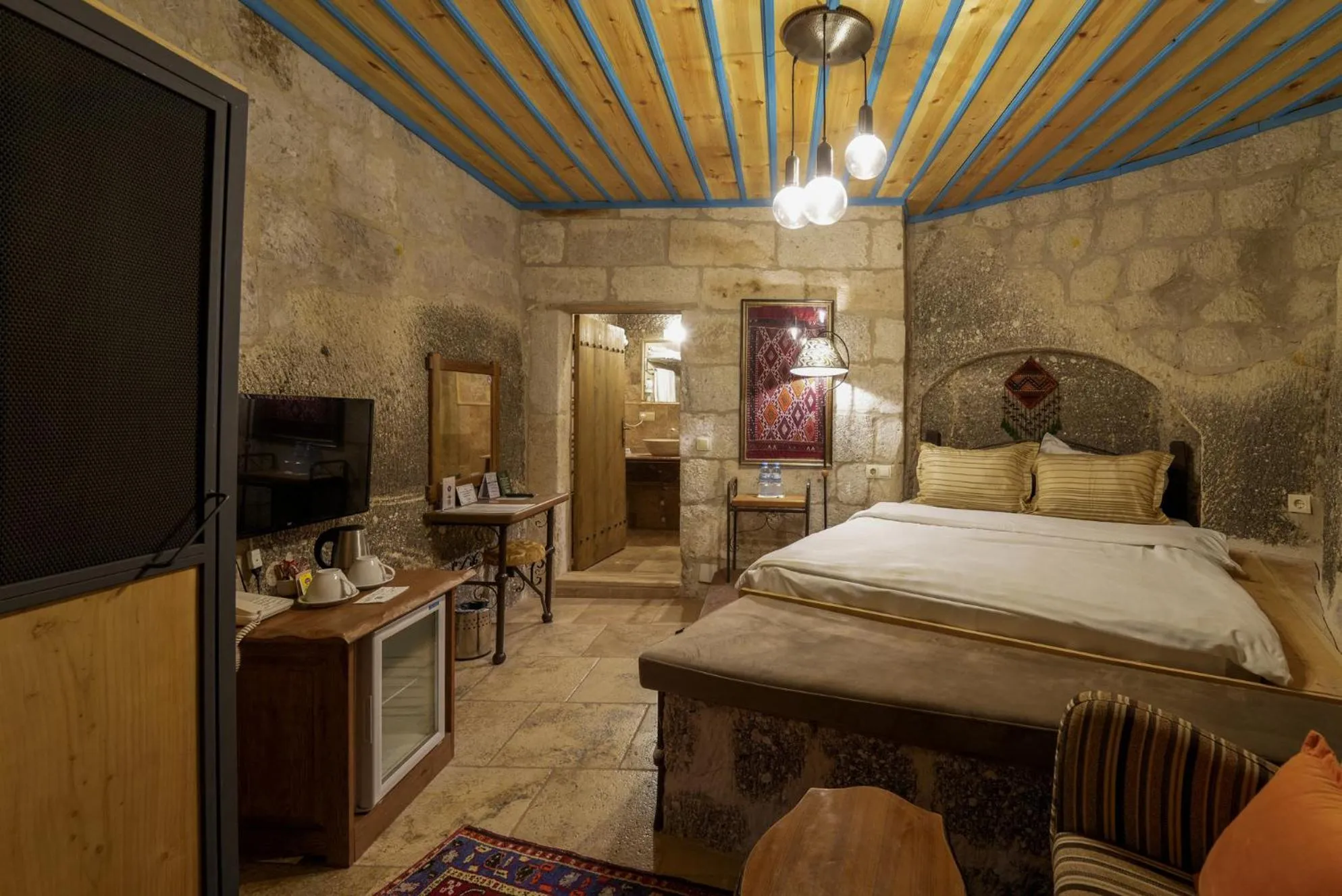 Bed in Tekkaya Cave Hotel