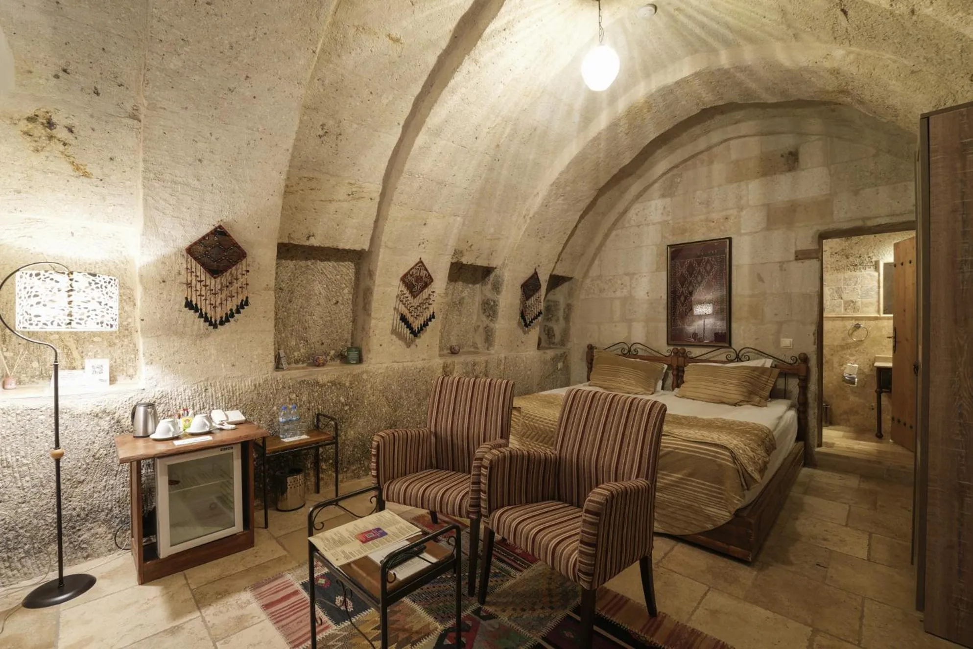 Bed in Tekkaya Cave Hotel