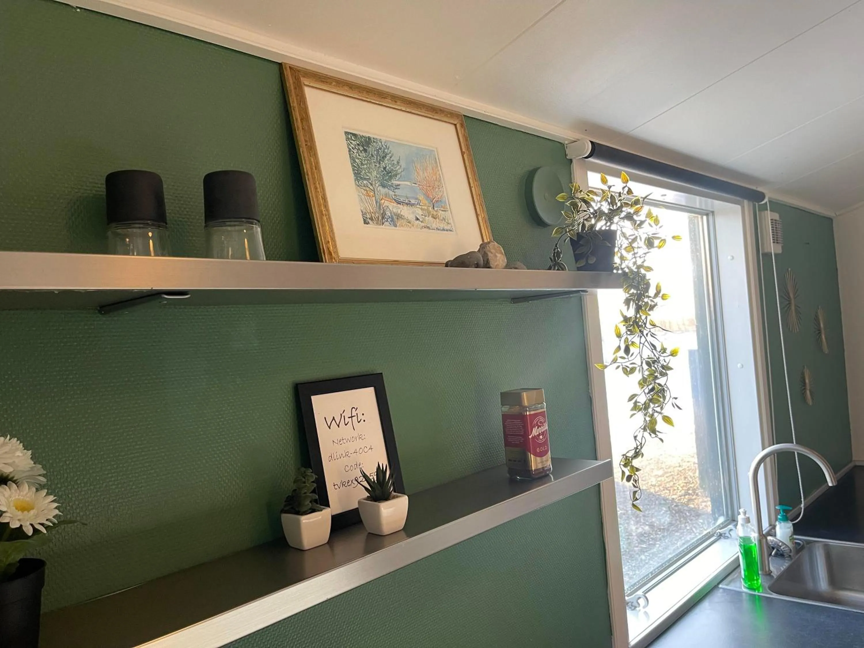 Kitchen or kitchenette in Toftum Bjerge Camping & Cottages