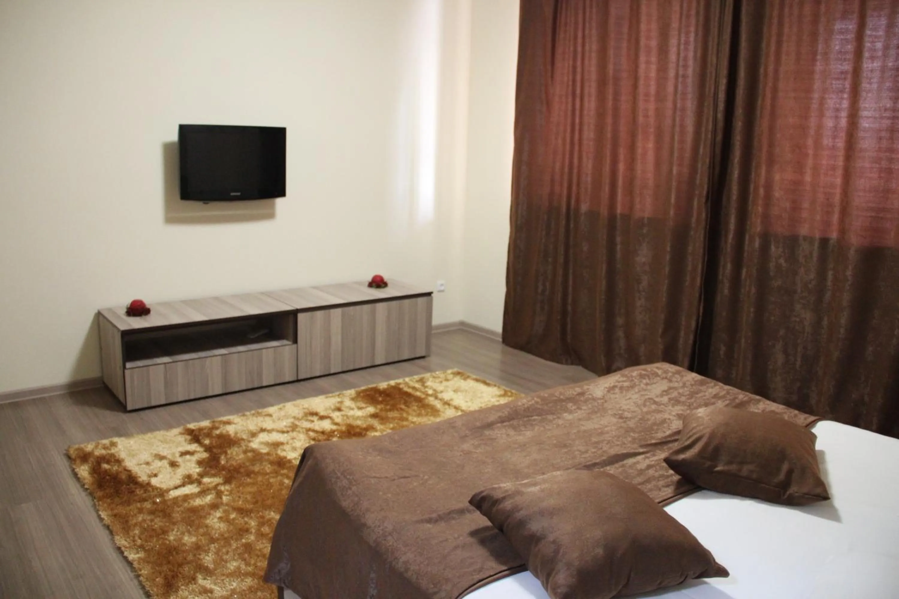 Decorative detail, Bed in Cross Apartments and Tours