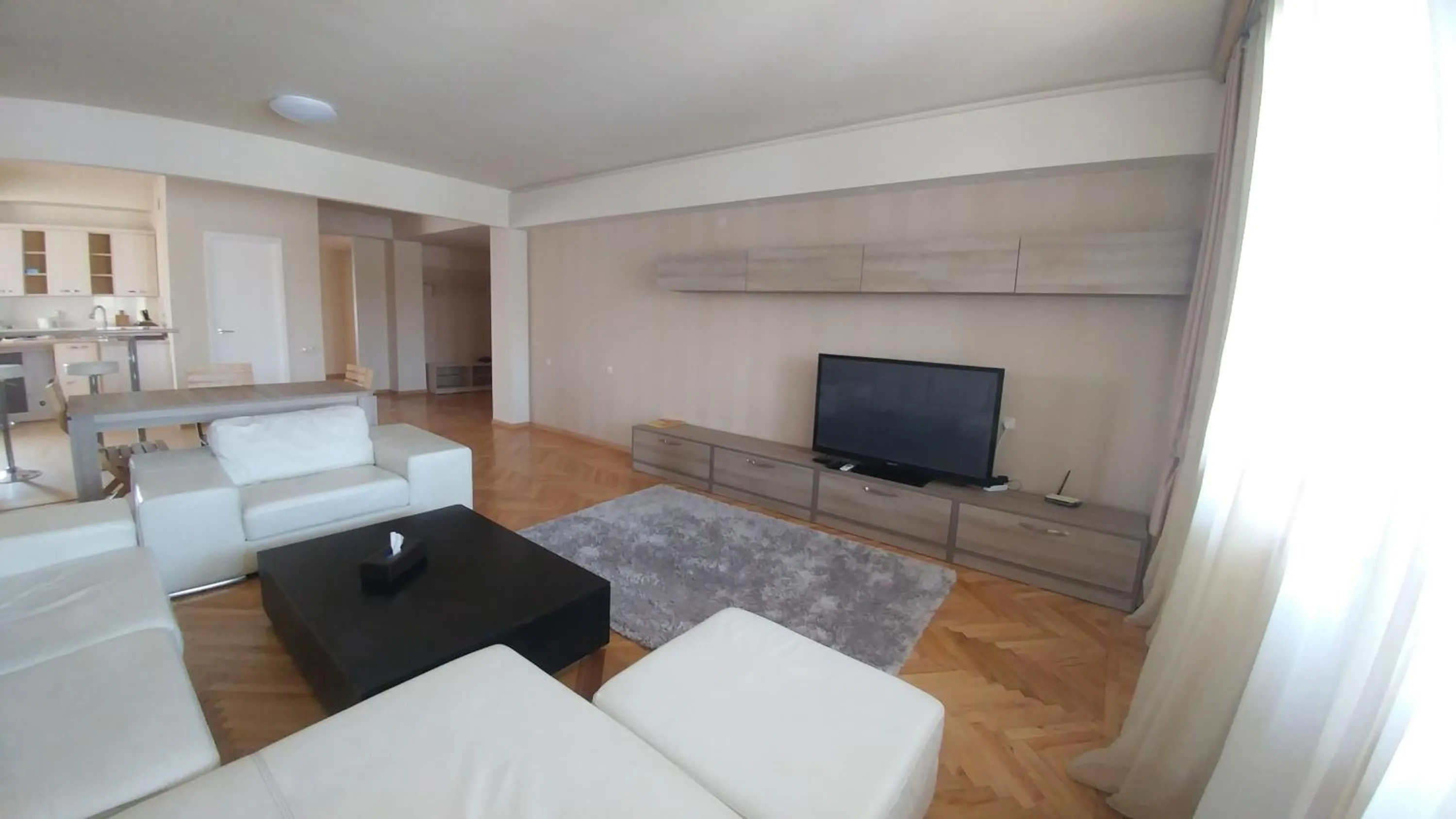 Living room in Cross Apartments and Tours