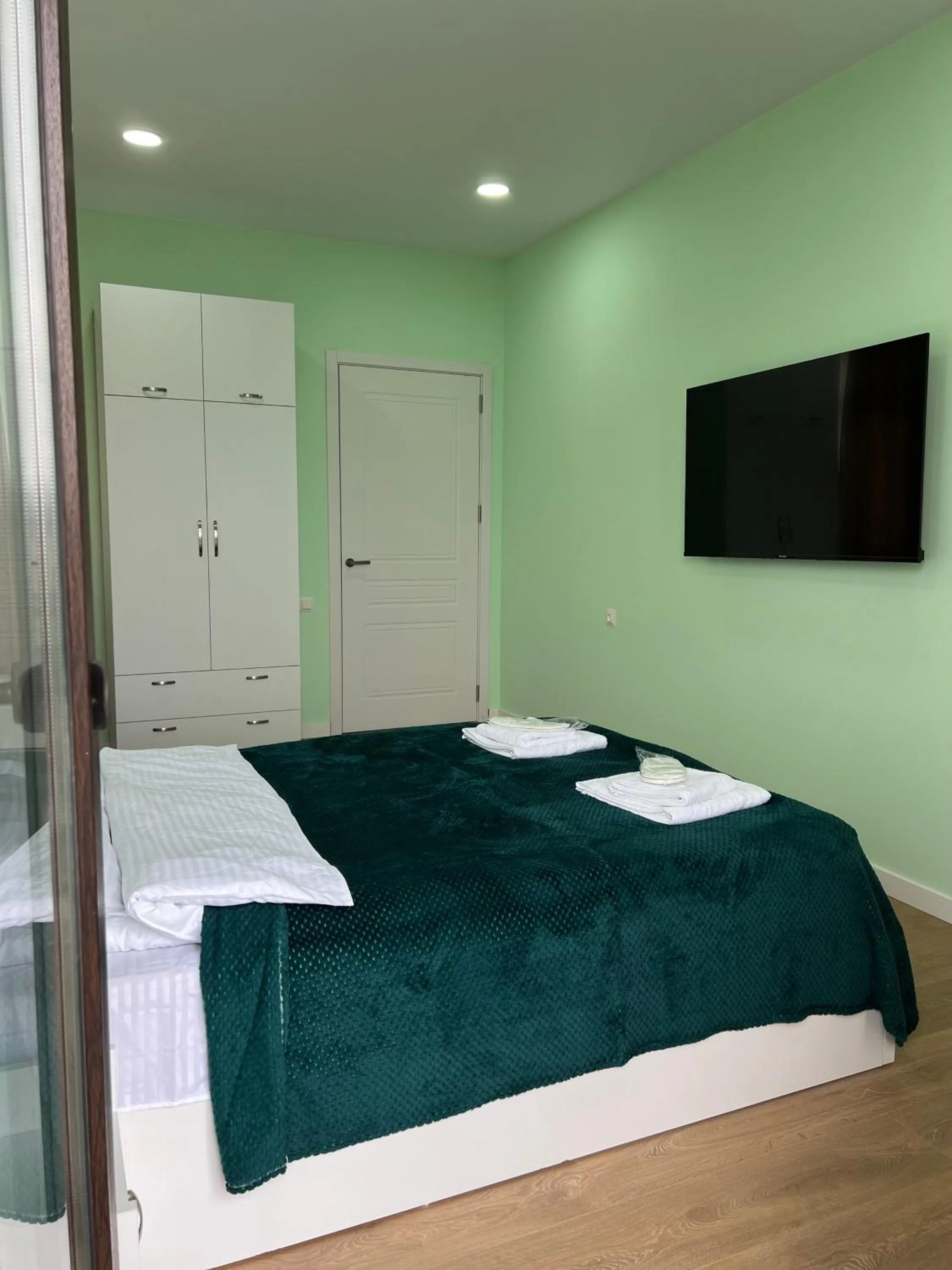 Bed in Panorama Hills Apart-Hotel