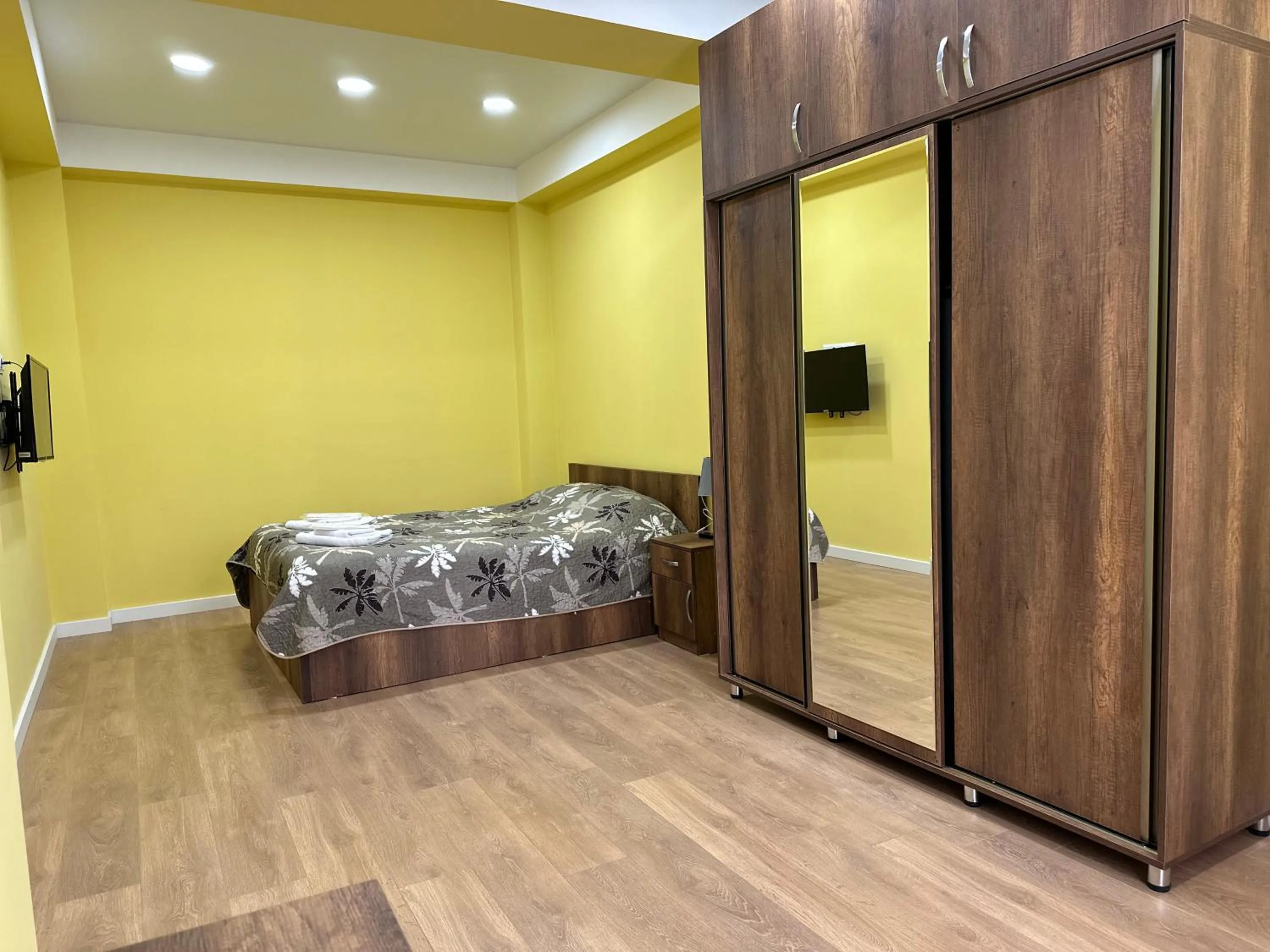 Bed in Panorama Hills Apart-Hotel