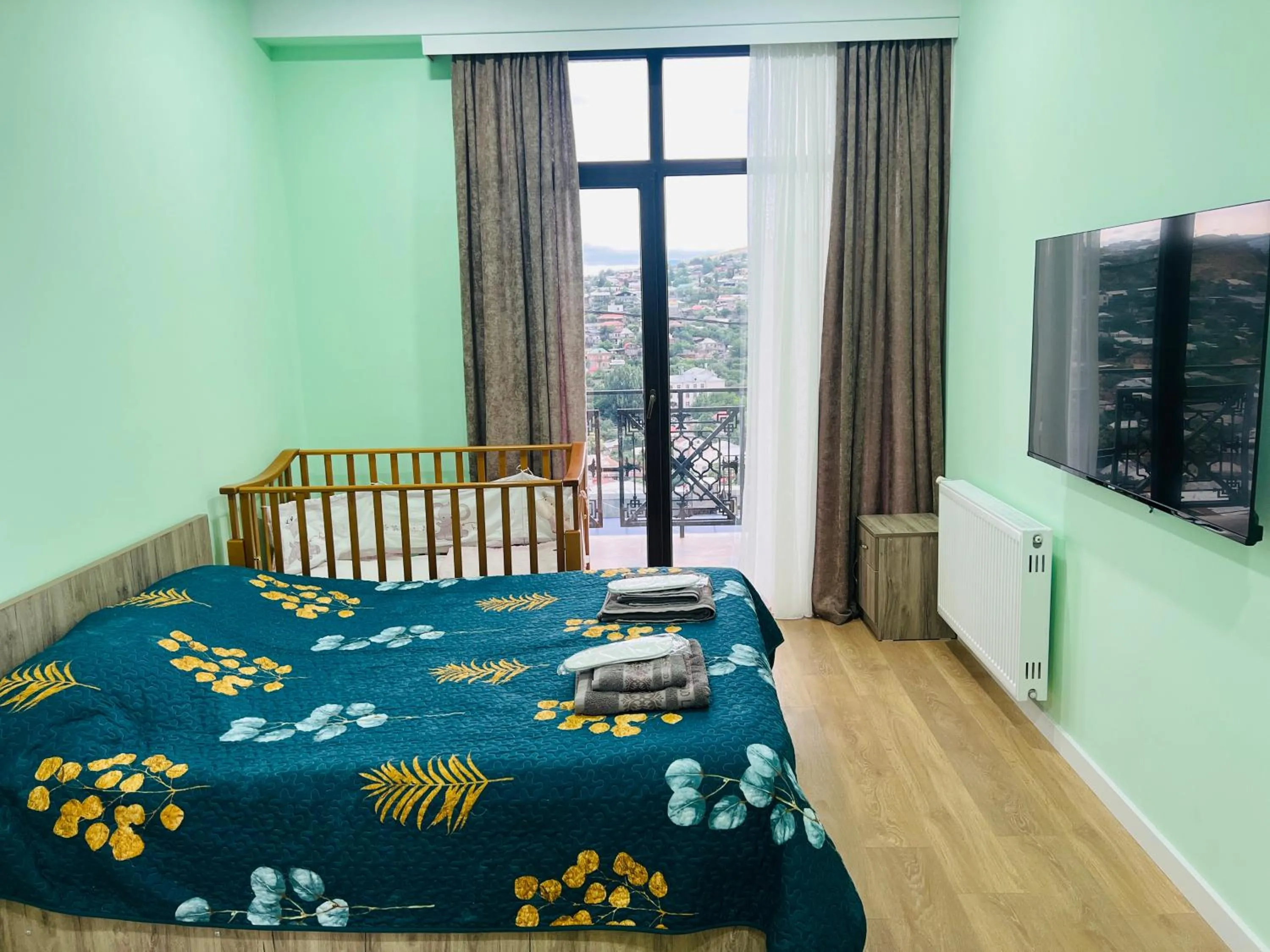 Bed in Panorama Hills Apart-Hotel