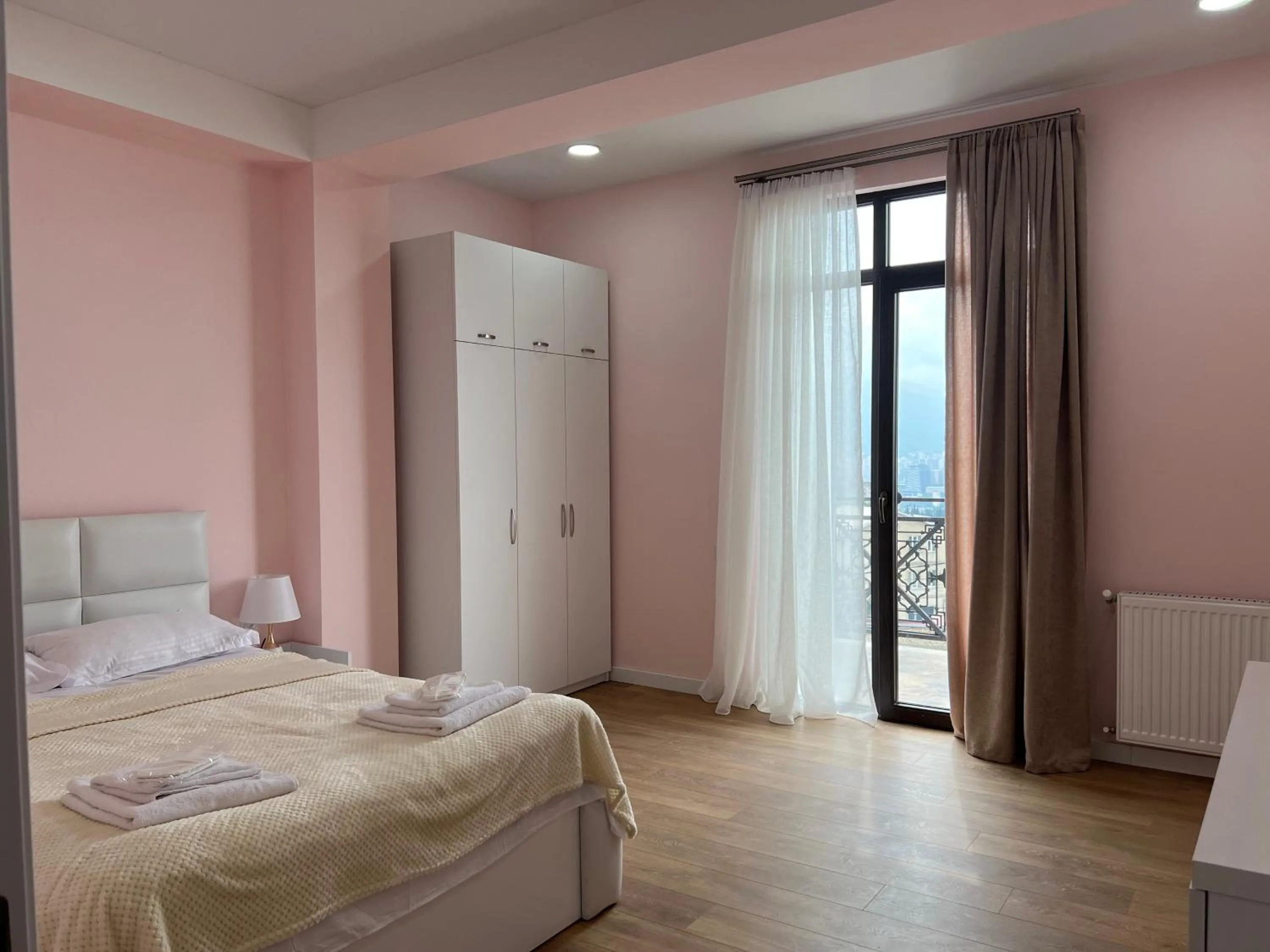 Bed in Panorama Hills Apart-Hotel