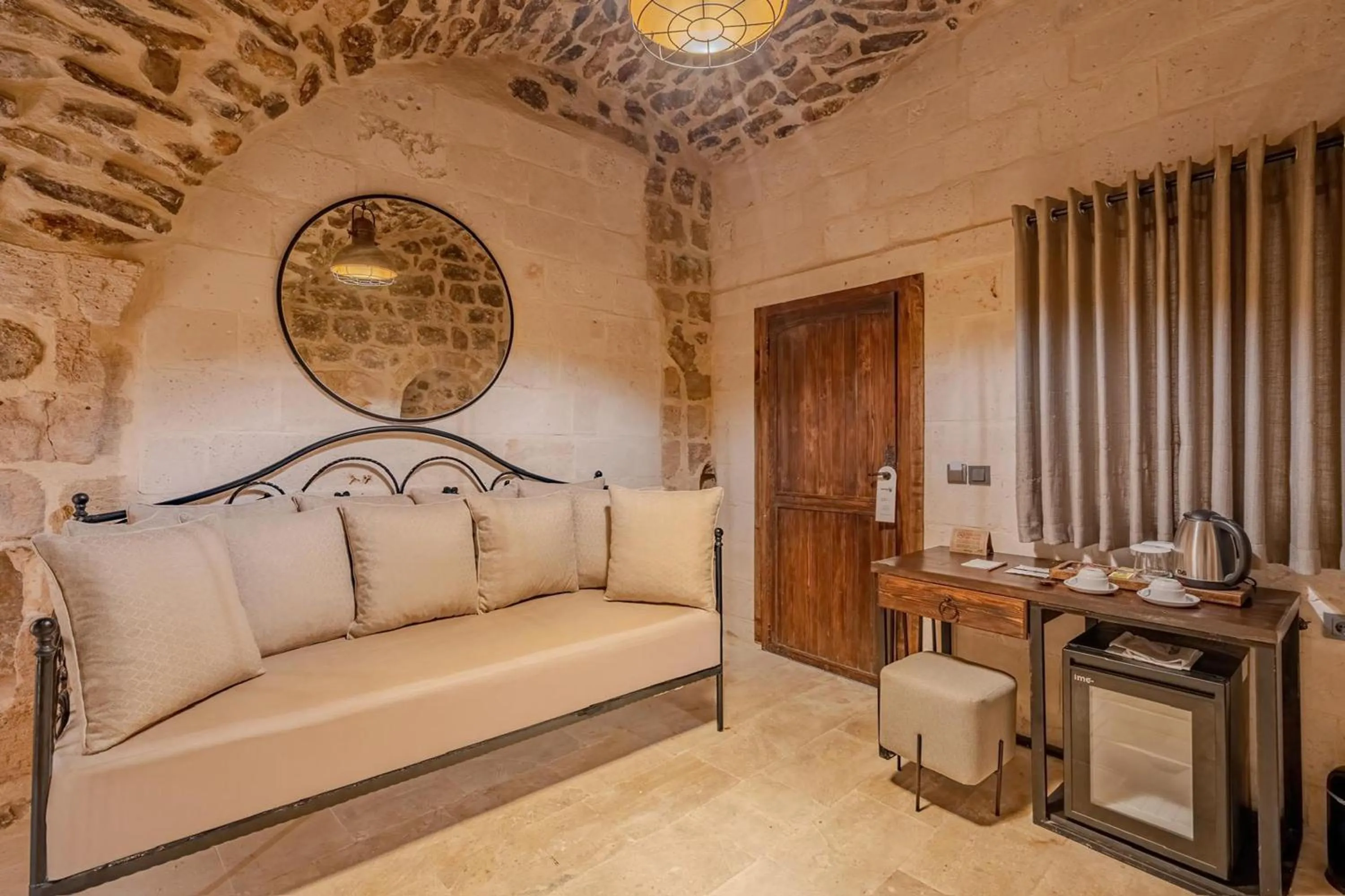 Seating area, Bed in Maran House Mardin