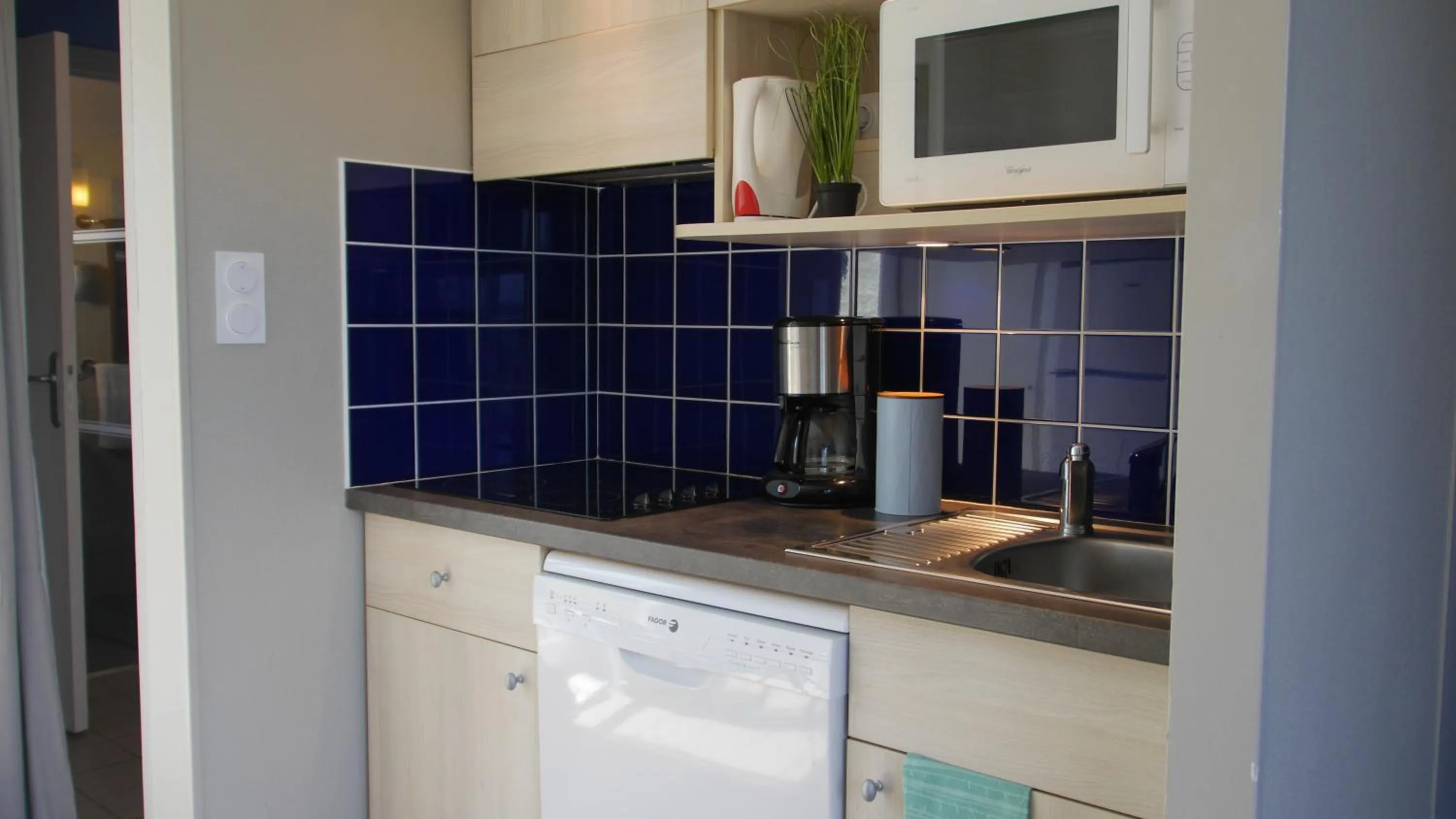 Kitchen or kitchenette in VVF La côte d'Emeraude Saint-Cast-le-Guildo