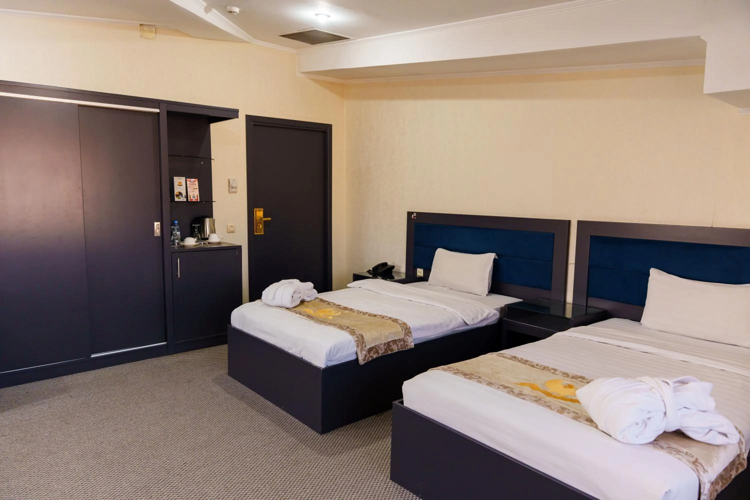 Photo of the whole room, Bed in Almaty Grand Erbil Hotel