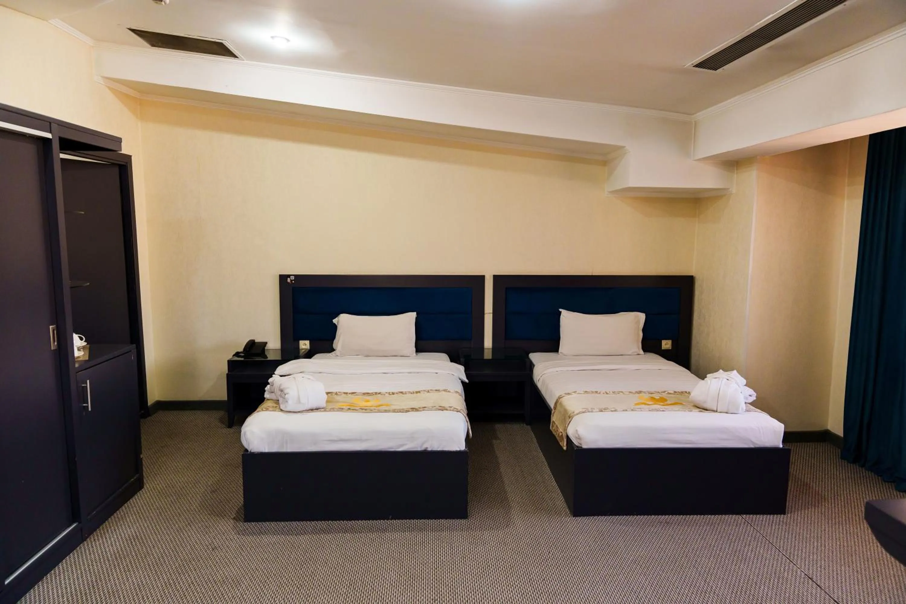 Photo of the whole room, Bed in Almaty Grand Erbil Hotel