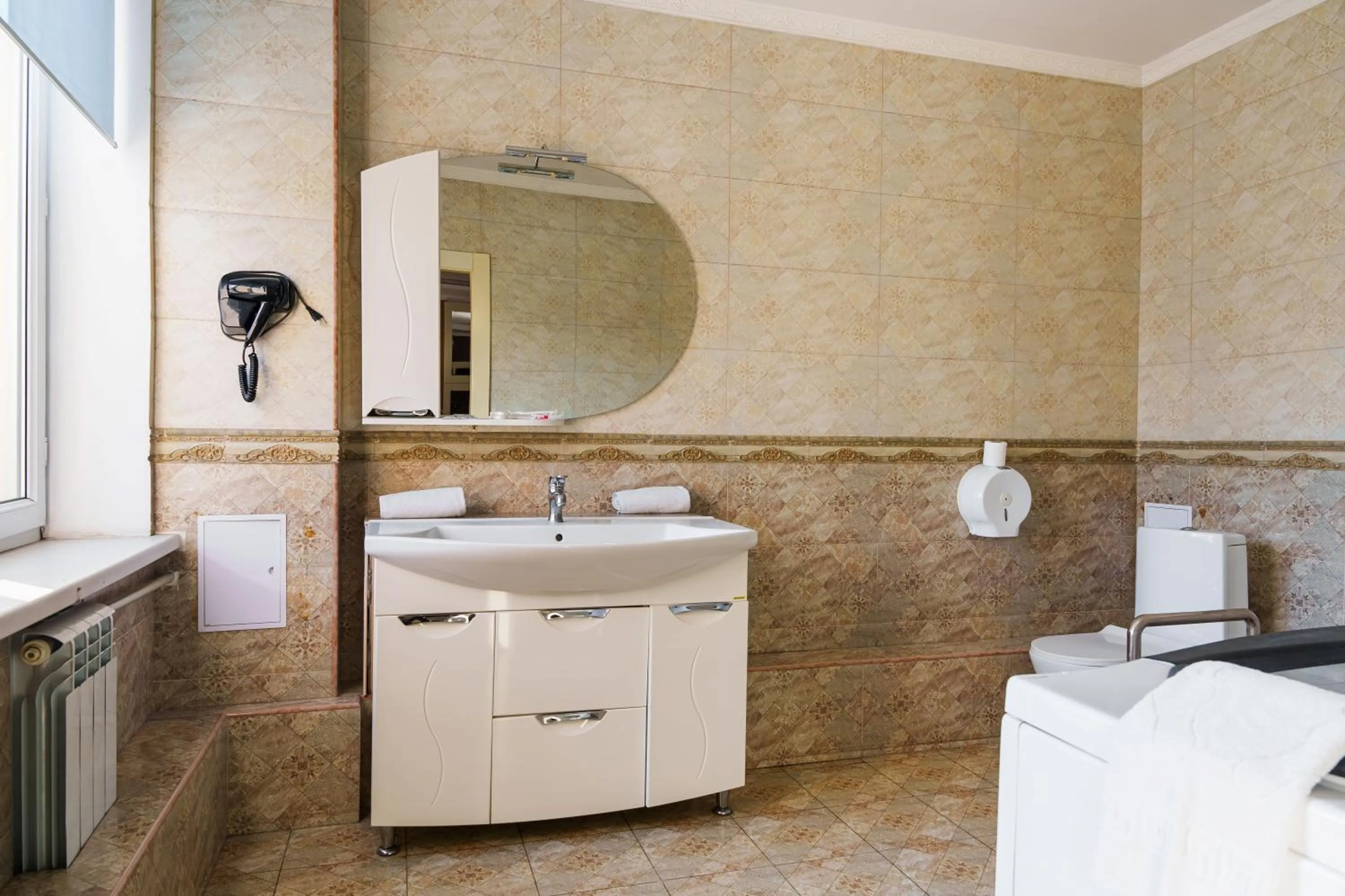 Bathroom in Almaty Grand Erbil Hotel