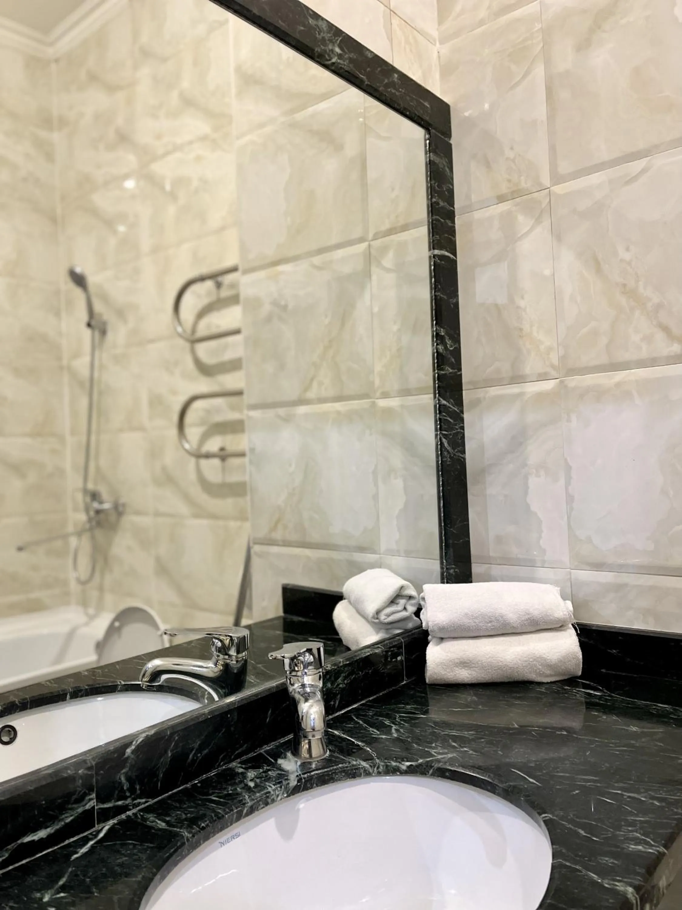 Bathroom in Almaty Grand Erbil Hotel